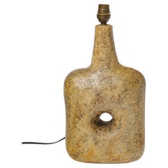 abstract 20th century yellow perforated ceramic table lamp by Christian Pradier