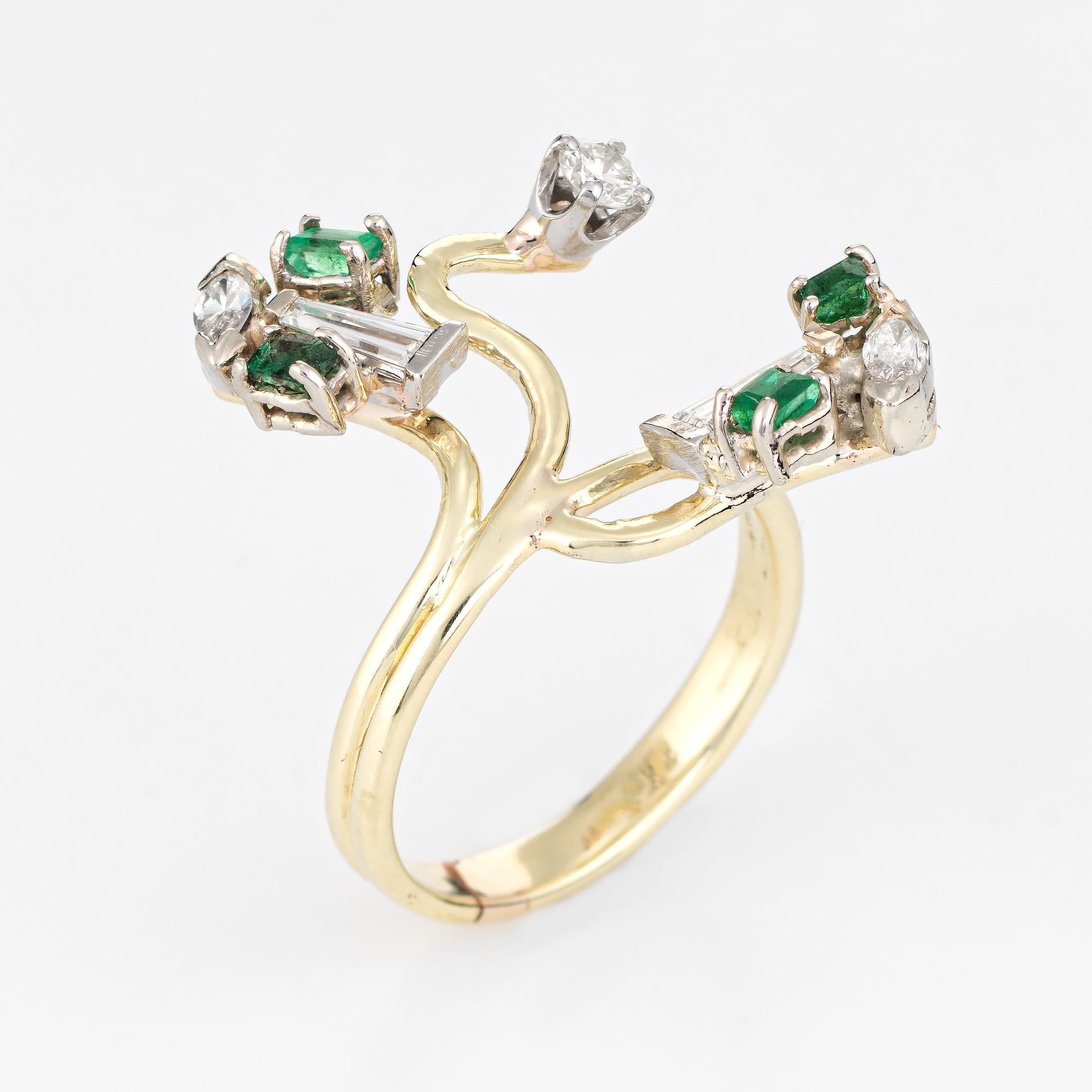 Finely detailed vintage emerald & diamond cocktail ring (circa 1960s to 1970s), crafted in 14 karat yellow gold. 

Mixed cut diamonds (baguette, marquise and round) total an estimated 0.60 carats (estimated at H-I color and VS2-SI2 clarity). The