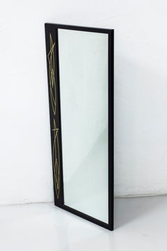 Abstract art mirror in black lacquer and metal inlays, 1950s