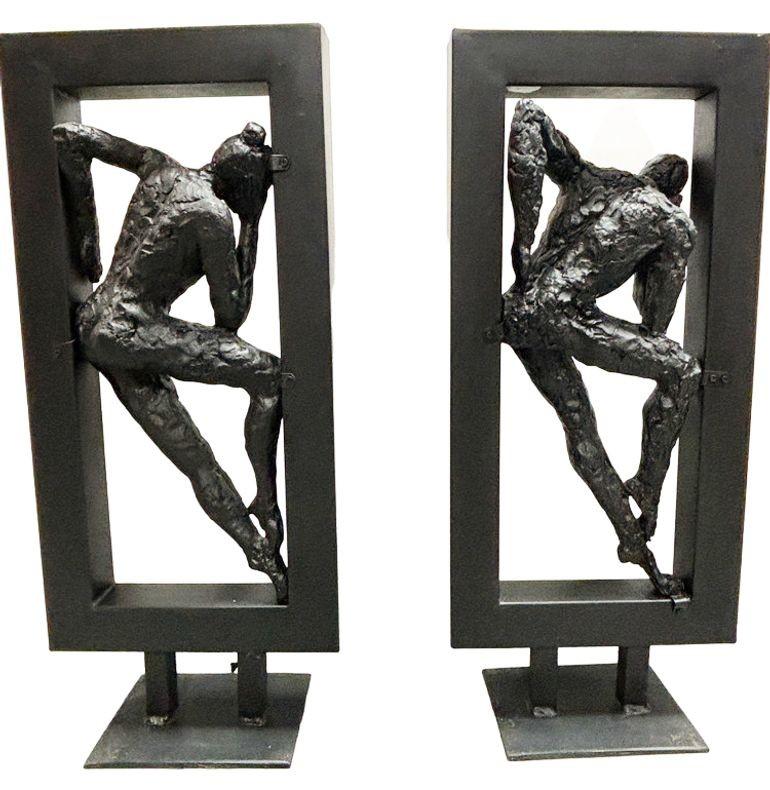 This exquisite vintage abstract bronze sculpture, crafted by renowned French artist Gerard Koch (1926-2014) for Austin Productions, captures the grace and beauty of male and female ballet dancers in an enchanting display of movement and
