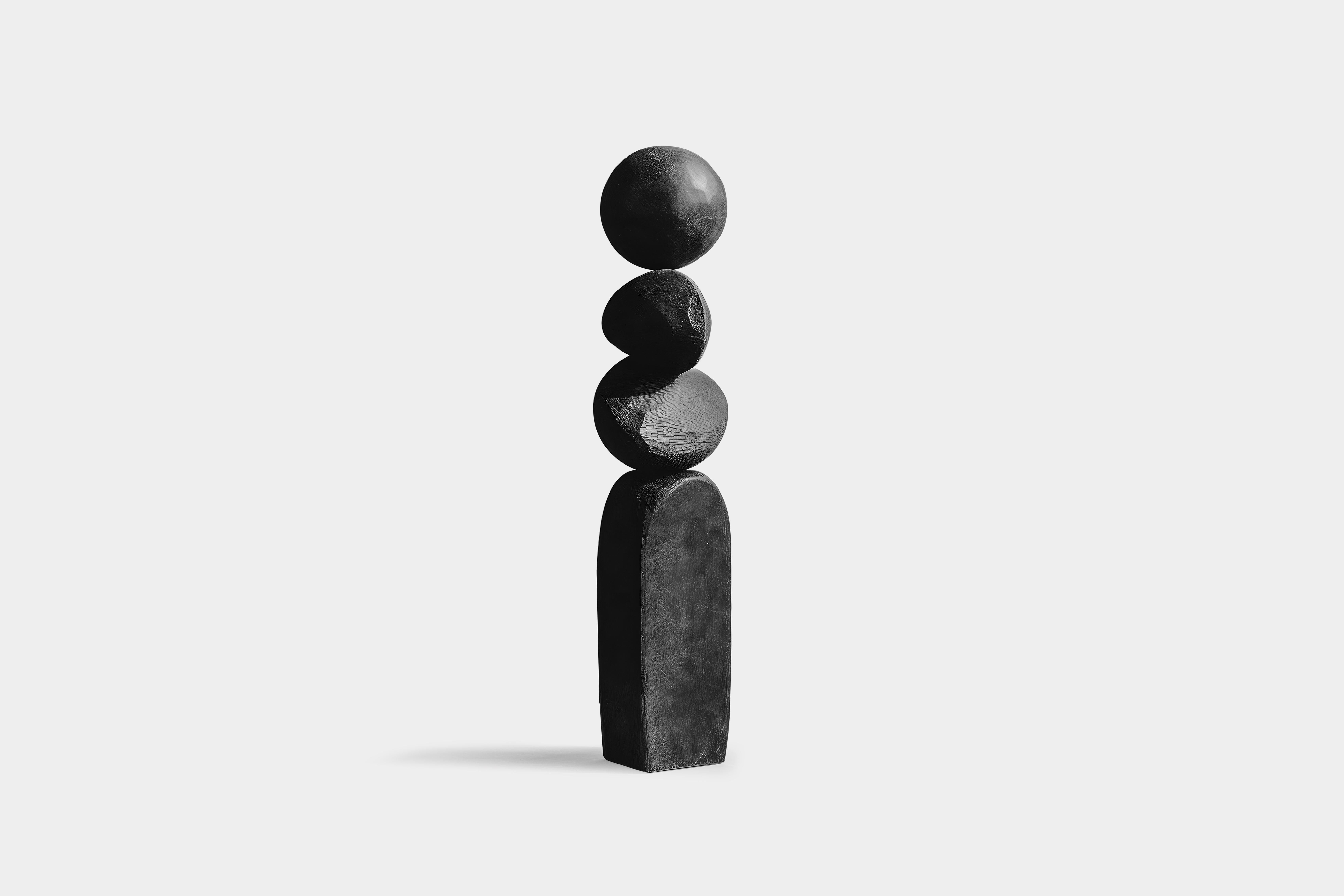 Abstract Beauty in Black Solid Wood, Escalona's Work, Still Stand No79
——


Joel Escalona's wooden standing sculptures are objects of raw beauty and serene grace. Each one is a testament to the power of the material, with smooth curves that flow