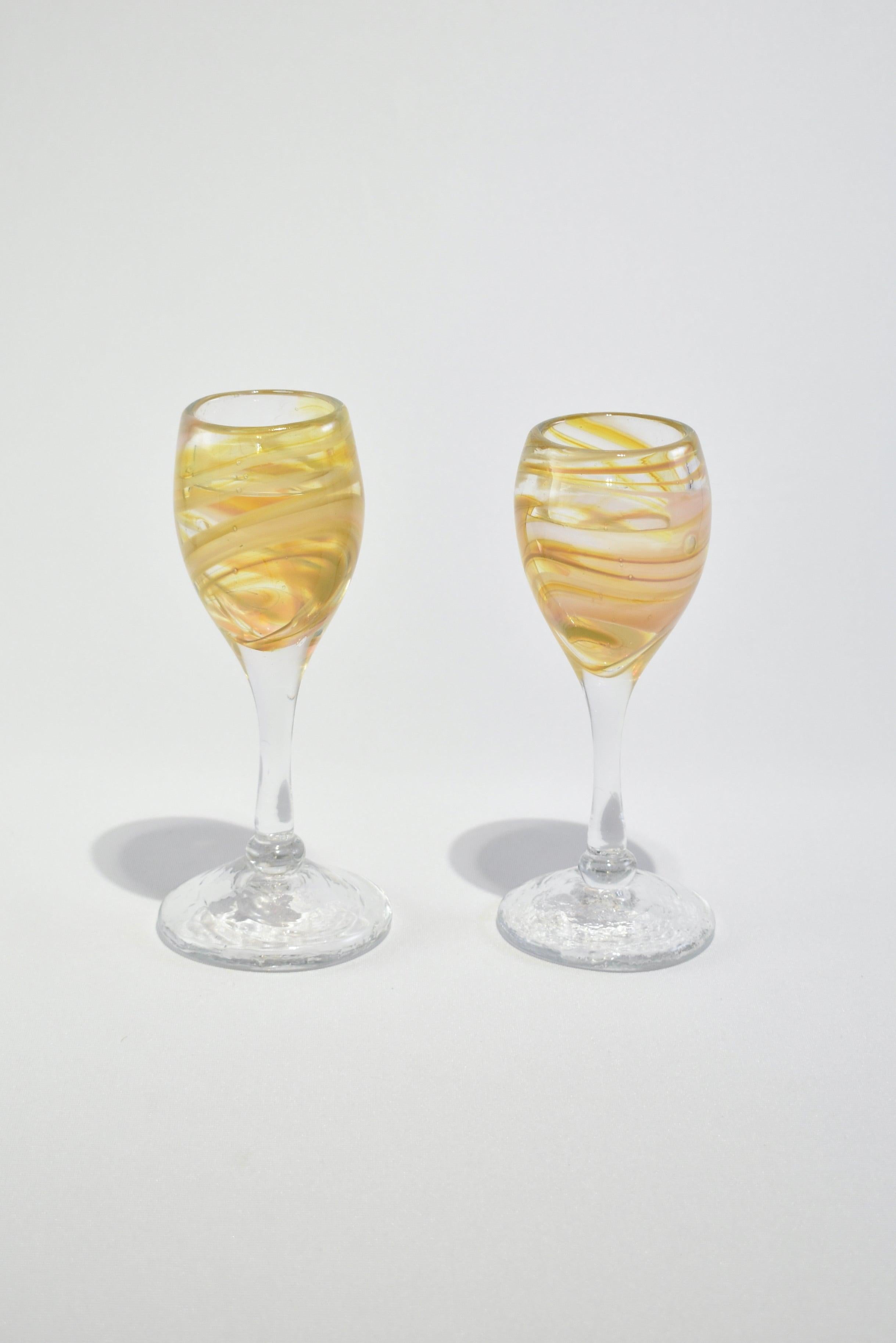 Stunning vintage blown glass goblets with a yellow and peach abstract design, set of two.