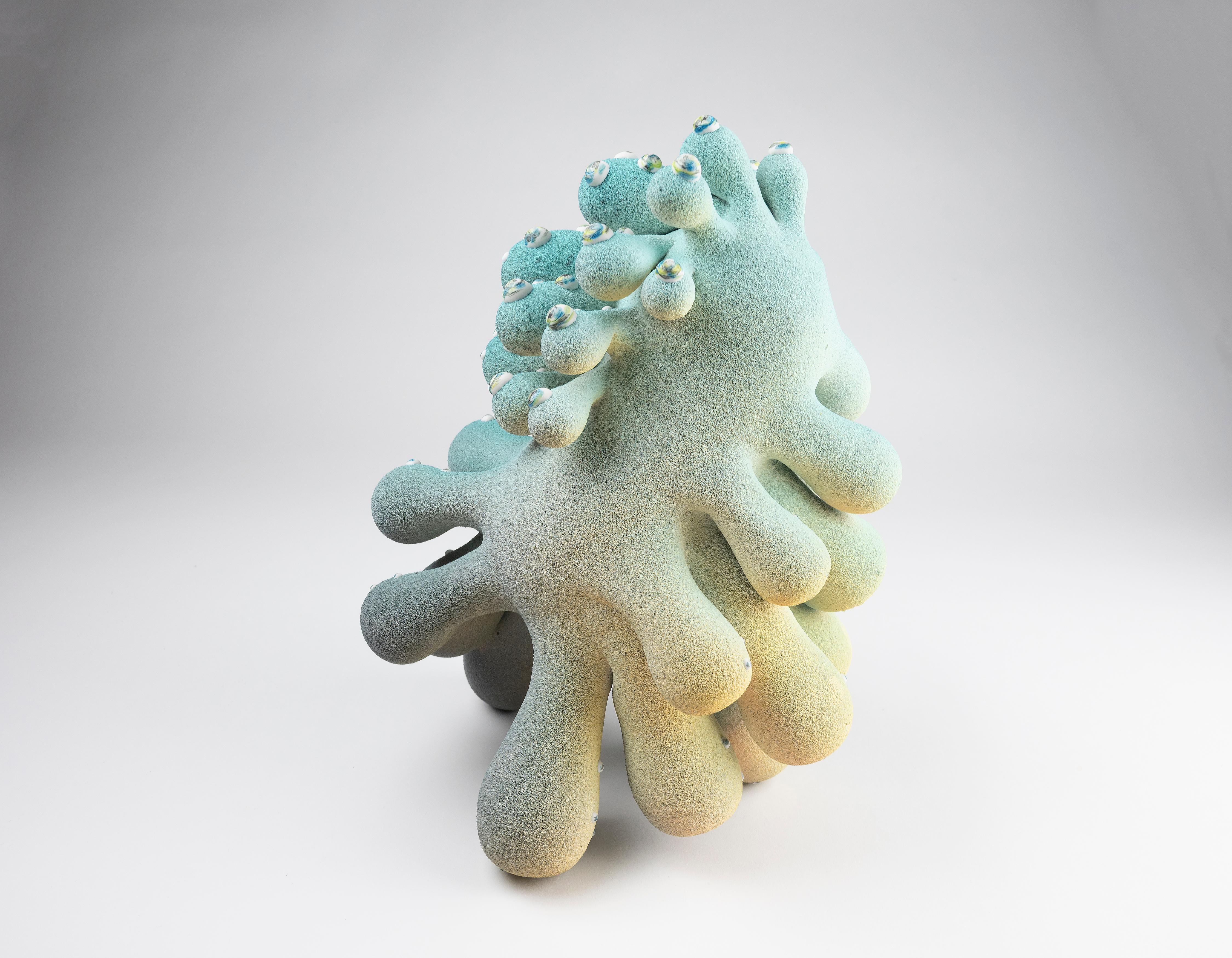 Judy, 2021 (Ceramic, C. 13.5 in. h x 11 in. w x 9.5 in. d, Object No.: 3860)

Toni Losey’s work hums with an underlying current of rhythm and organization.  The repetition found on the wheel influences her work as Losey intuitively builds sculptural