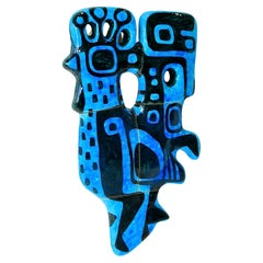 Abstract blue chicken wall sculpture signed and dated 1960