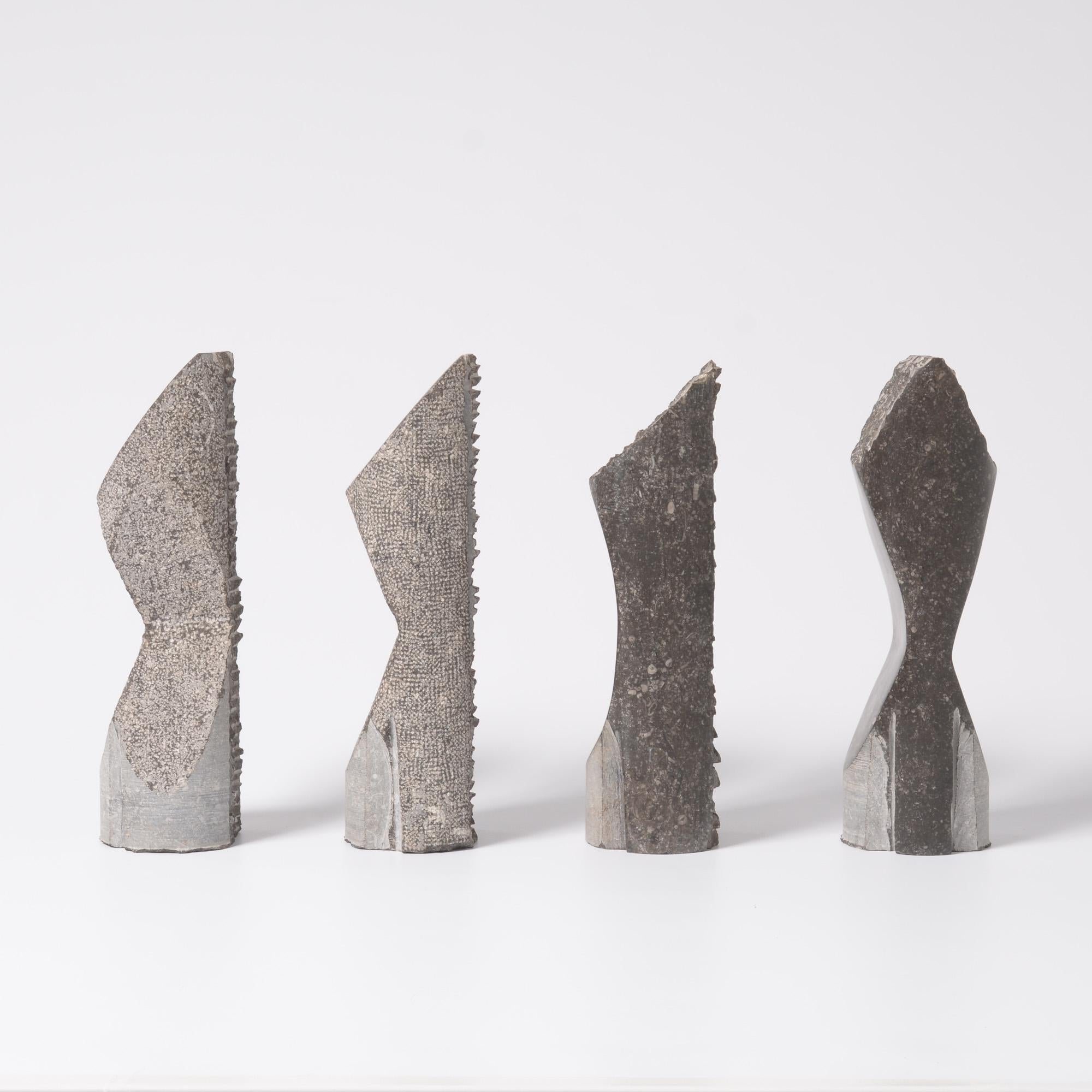 These column sculptures are created by the Belgian sculptor Jorg Van Daele (°1966).
The sculptures are made of Belgian bluestone.
On the one hand, each sculpture is an individual creation, with different shapes and textures. On the other hand, the