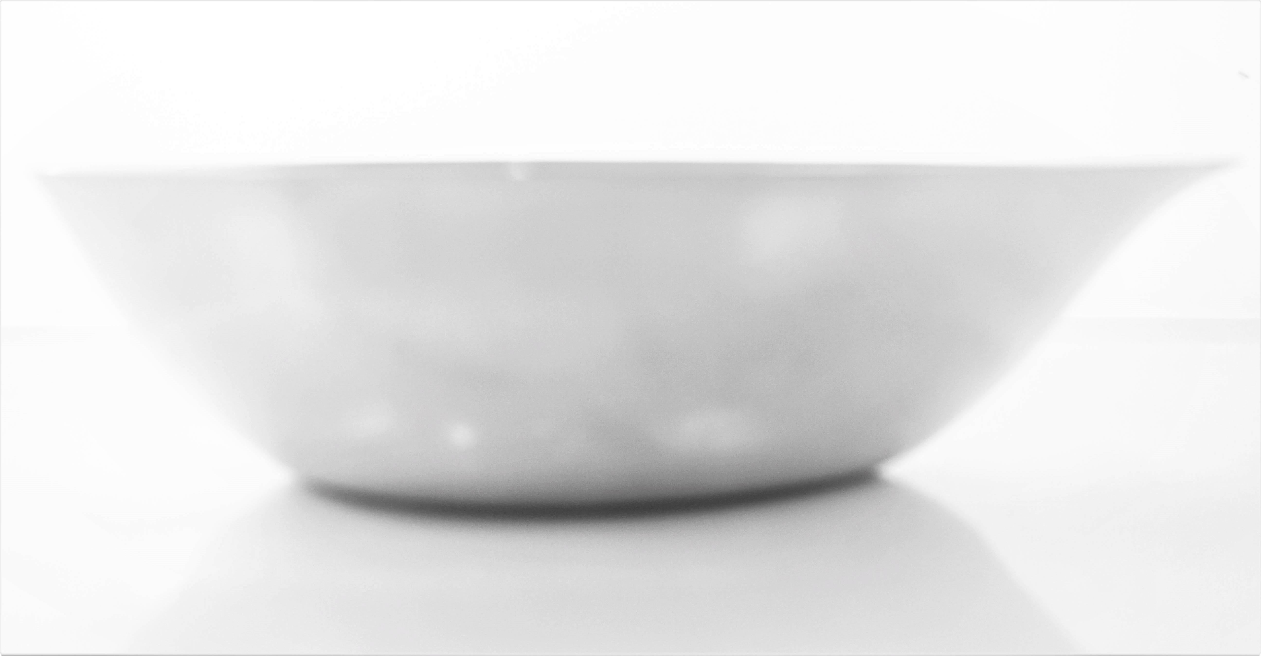 If you are like me, you like the odd and unusual. Here we have a fine example of something different; an abstract shaped bowl. It may look like a triangular shaped but if you look closer you will see that one side isn’t even with the other. It has