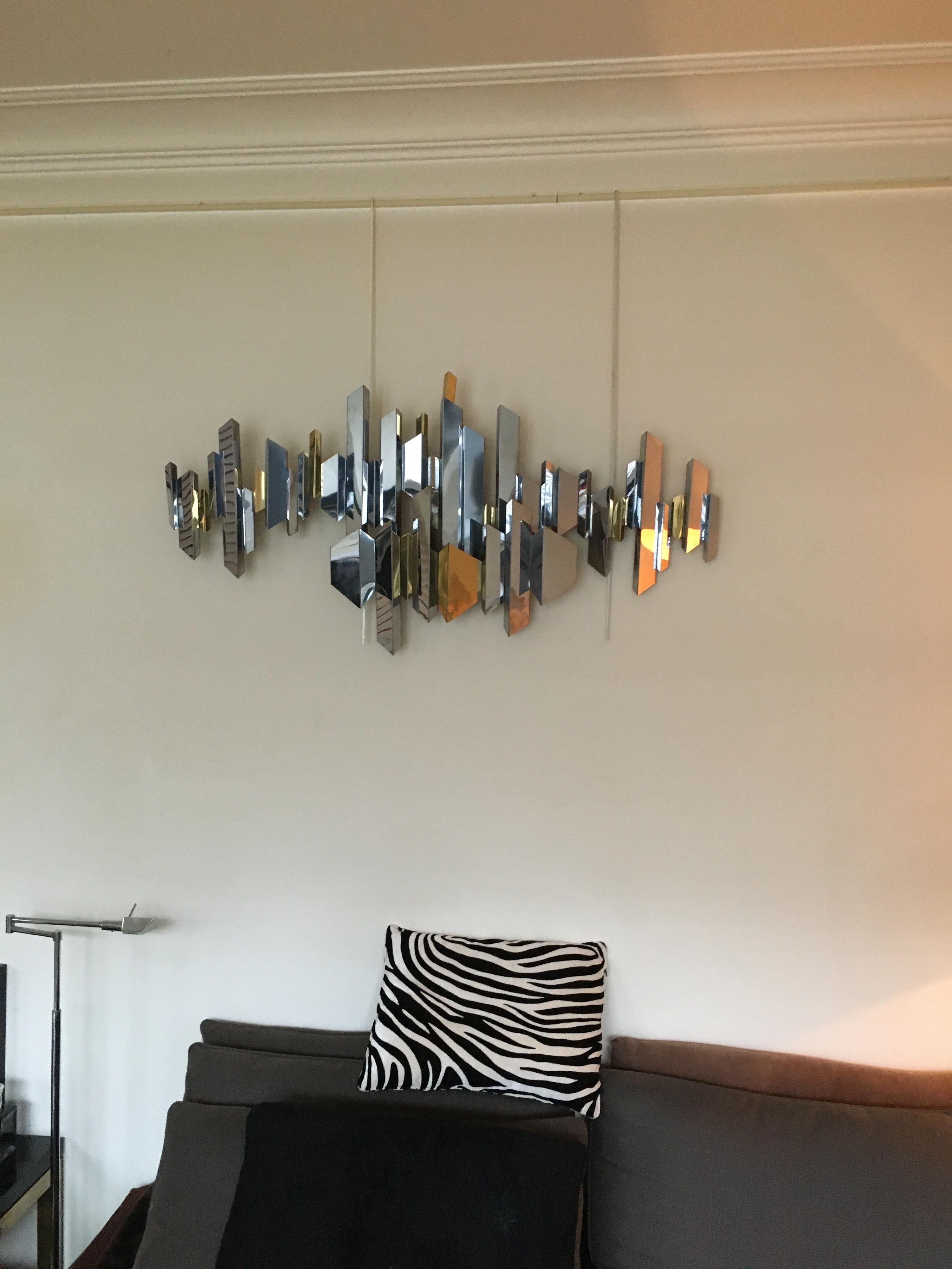 Two tones (chrome and brass) 1970s wall sculpture by Curtis Jere.
Can be fixed horizontally or vertically.
Signed C.Jere.