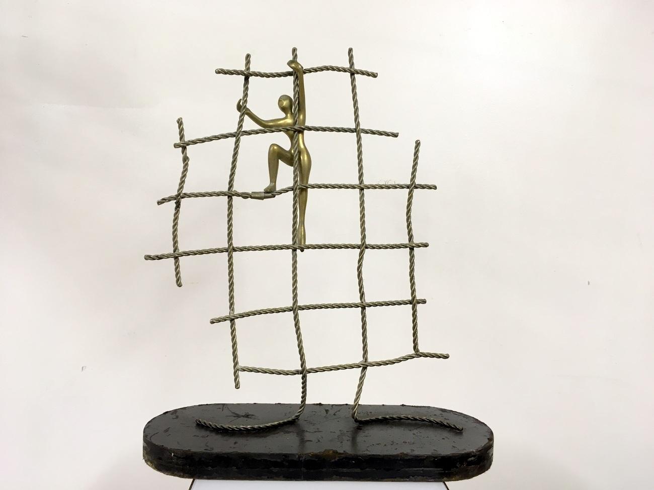 20th Century Abstract Brass Figure Climbing a Net Scuplture