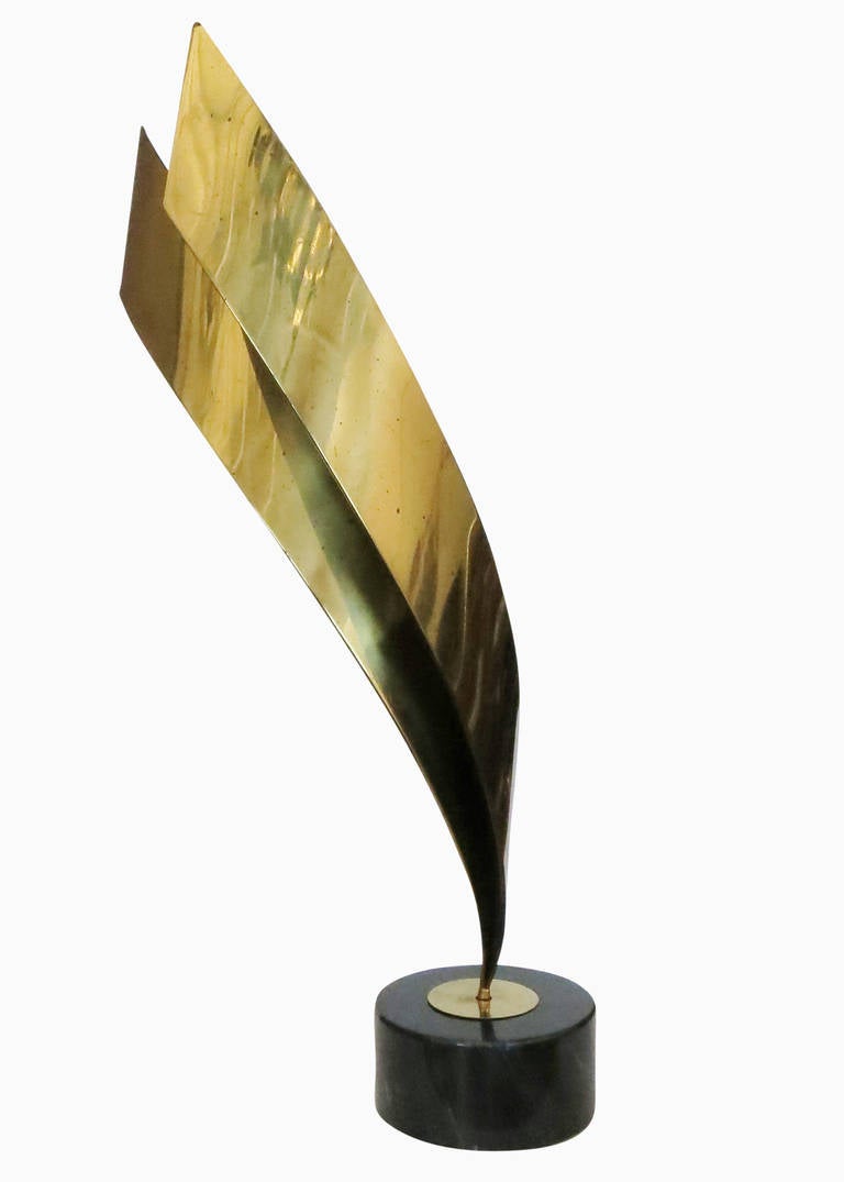 Tall brass abstract table sculpture on marble base by Curtis Jere, circa 1984.

   