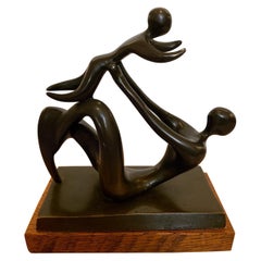 Abstract Bronze of Mother and Child on a Solid Oak Base