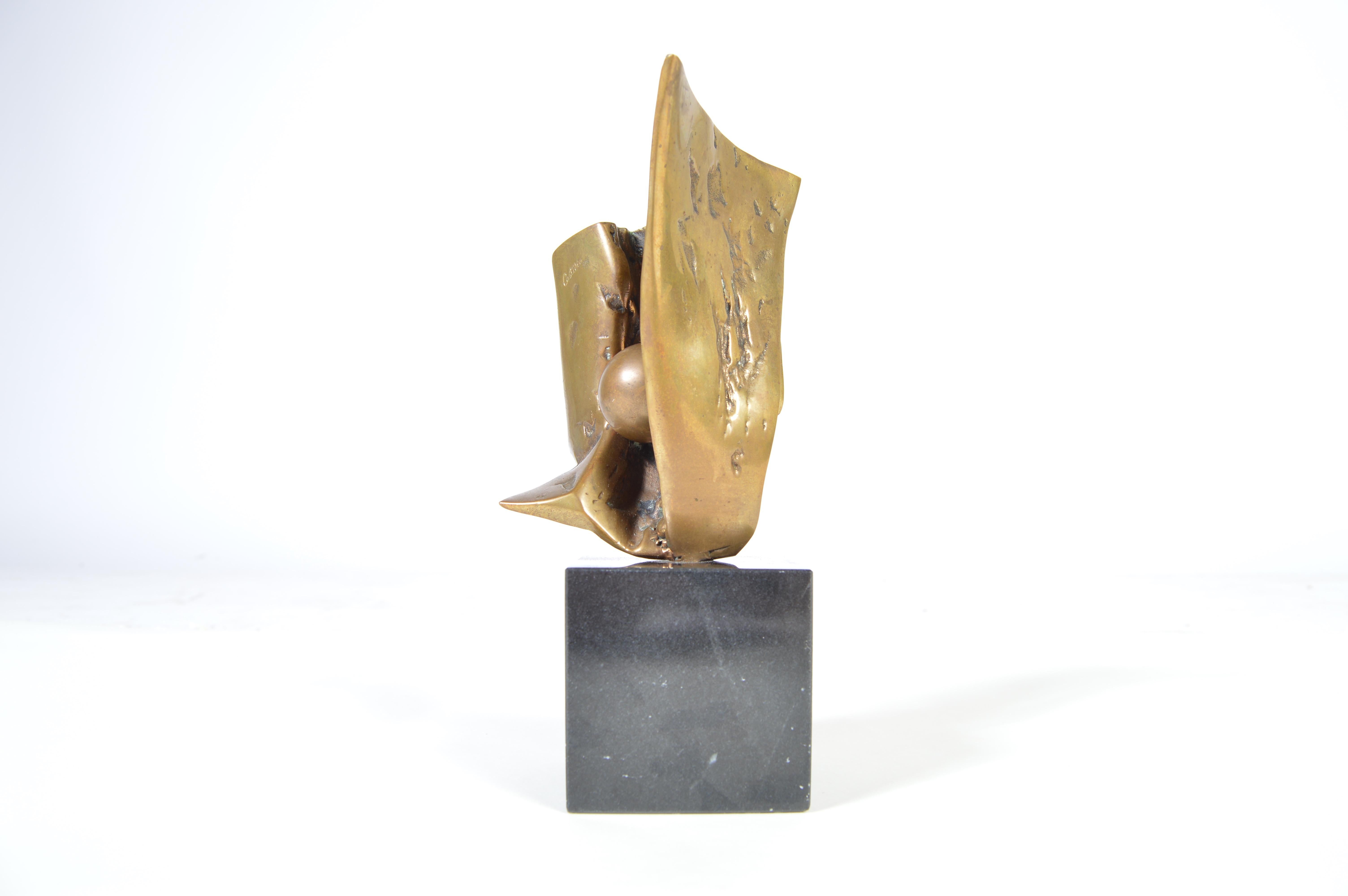 A beautiful small bronze abstract sculpture by Jorge Castillo with granite cube base, circa 1970. Signed and numbered.
Measures: Height 7.75