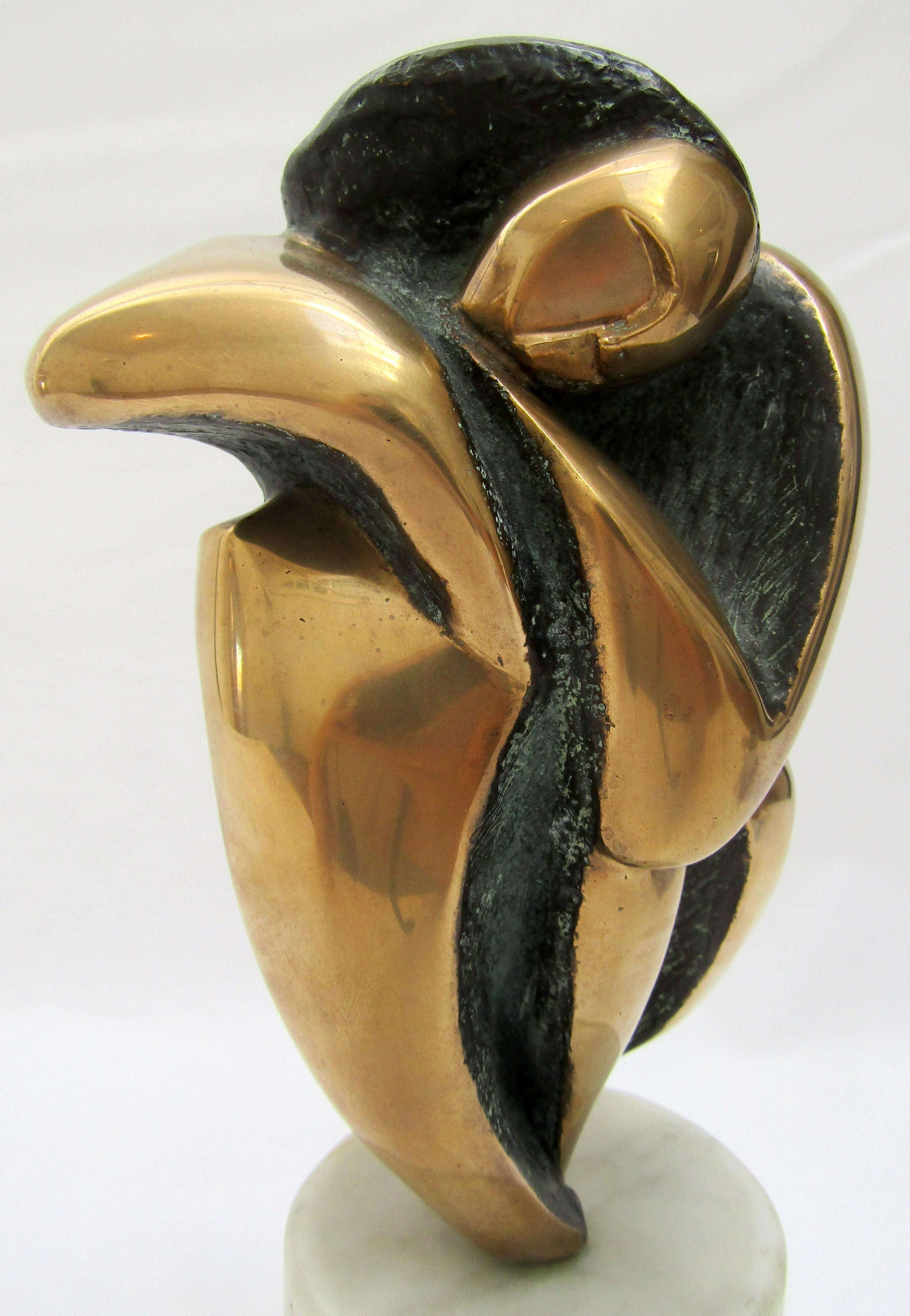 An abstract polished and patinated bronze
sculpture on a marble plinth
indistinctly signed and dated 1989
French.

Measures: Height 11 ¾ in / 29.5 cm.