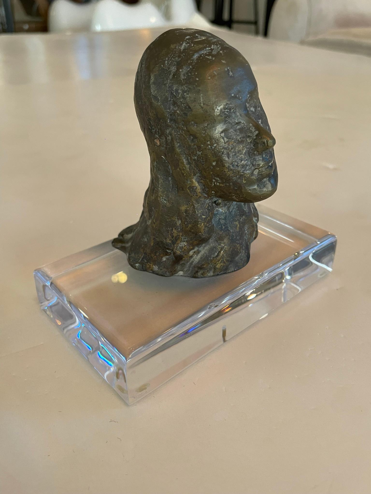 Expressionist bronze sculpture, female head figure on Lucite base, France, 1930s.