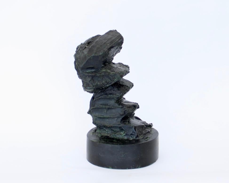Patinated Abstract Bronze Sculpture Reminiscent of Naturally Emerging Rocks For Sale