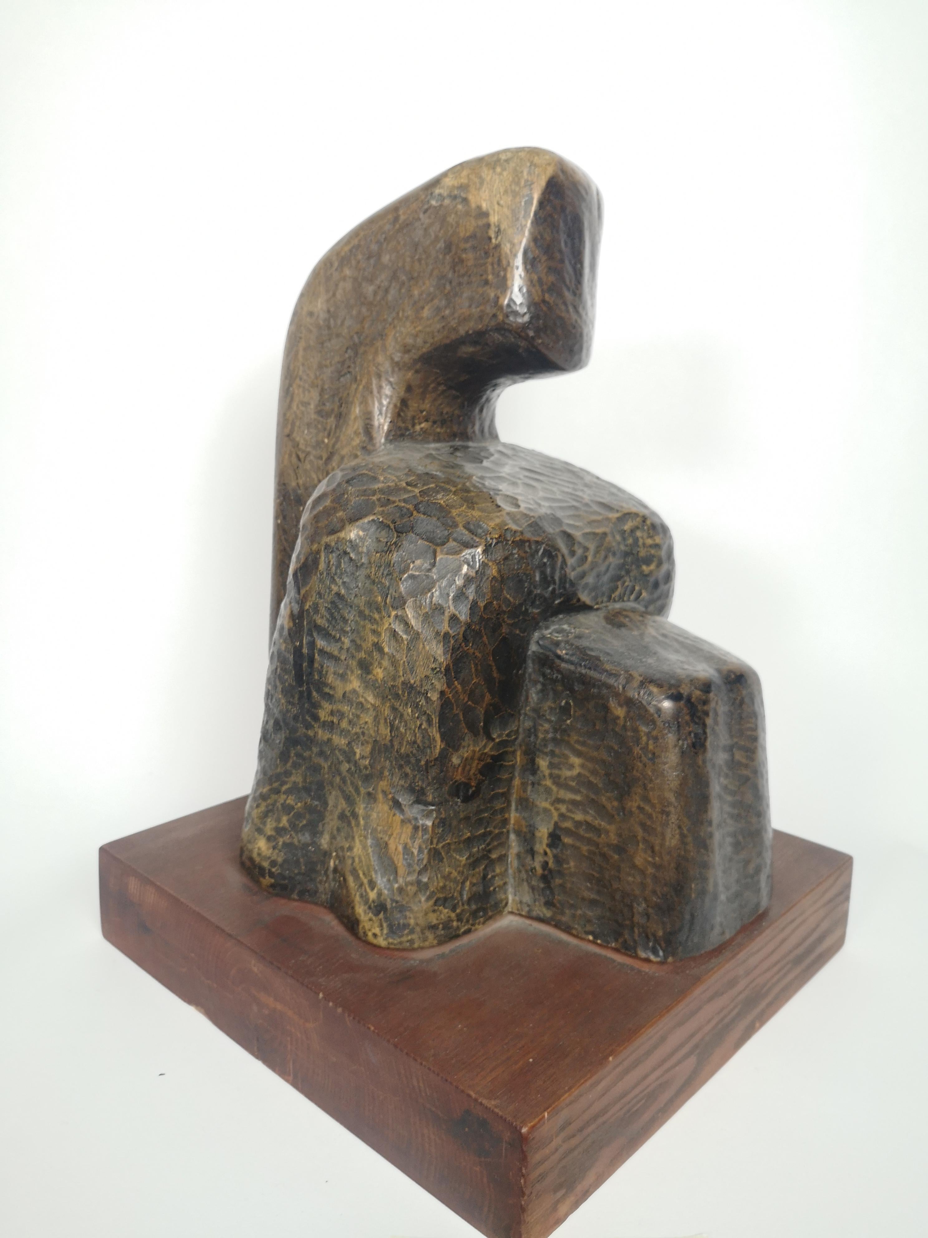 This hand carved wooden sculpture is in great condition-made in the 1970s was signed by the artist, 