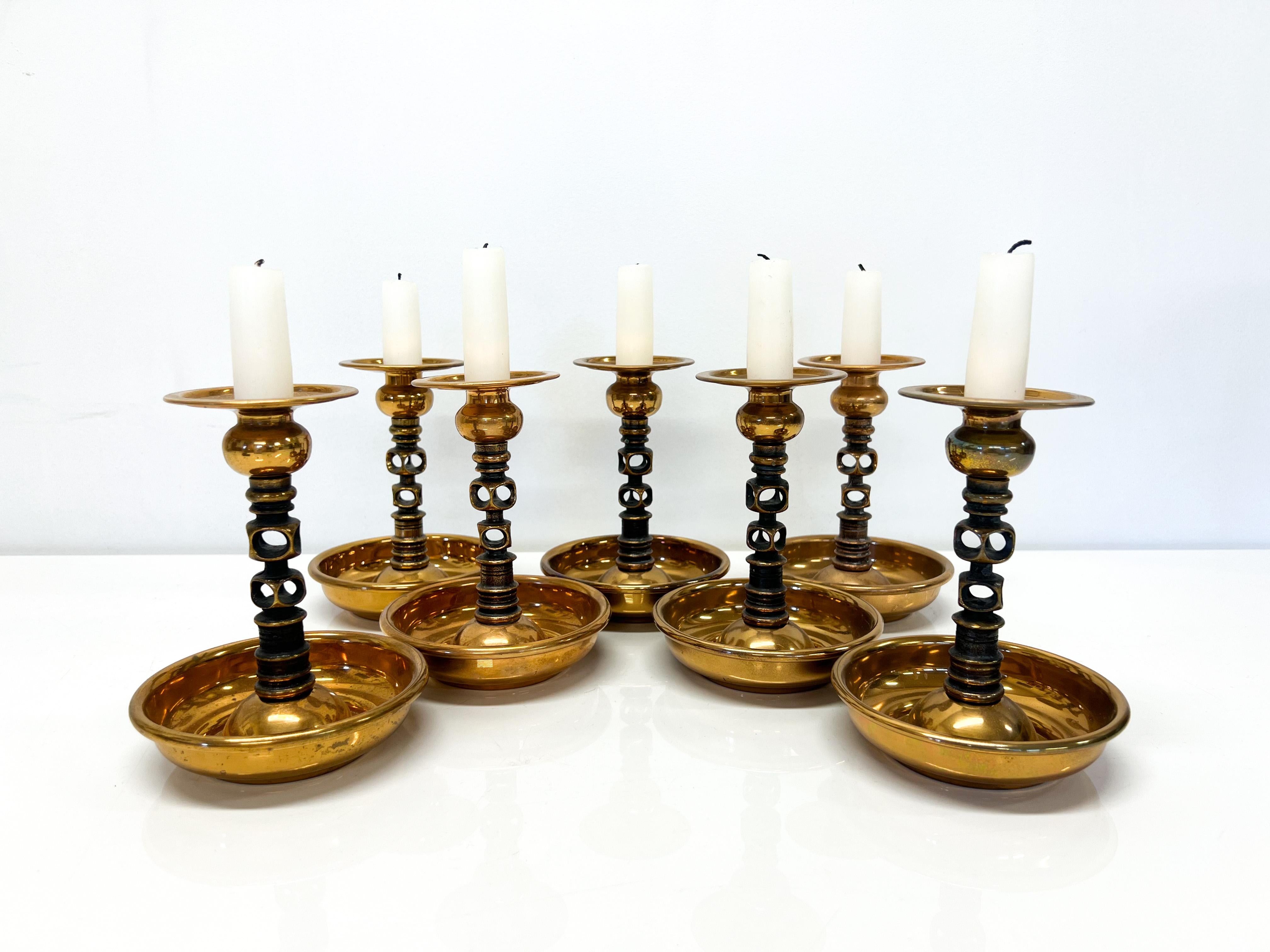 Abstract Candle holder Jorma Laine Turun Hopea Finland 7pcs.

Very special Candlesticks.
Hard to find these anywhere anymore.

Jorma Laine (1930-2002) was a Finnish jewelry designer, whose work in bronze and silver (more seldom gold) is easily