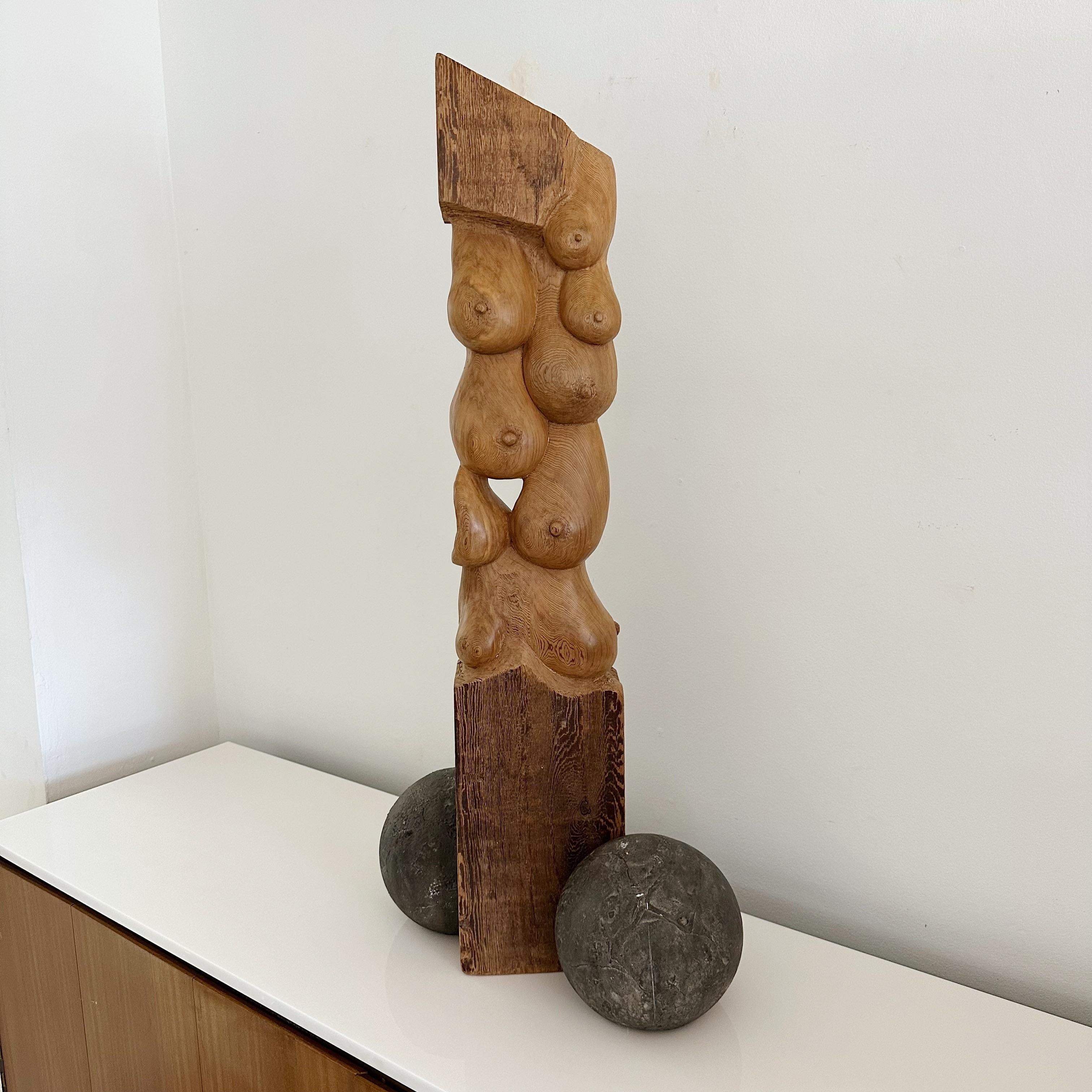 Striking Female Form Abstract Carved Wood Sculpture by Talented Artist Orlando Chiang from the early 2000s. 
Exceptional carved wood sculpture depicting the female form. Crafted by the talented artist Orlando Chiang in his studio, this sculpture is