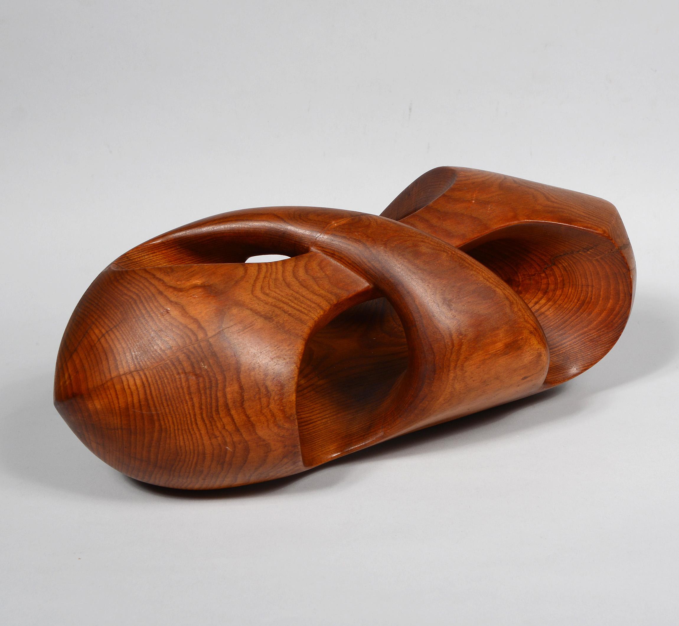 Carved wood abstract sculpture in the form of a knot. This is from the 1950s-1960s. This is one of a small group of these sculptures by an anonymous artist we acquired. It is not signed.