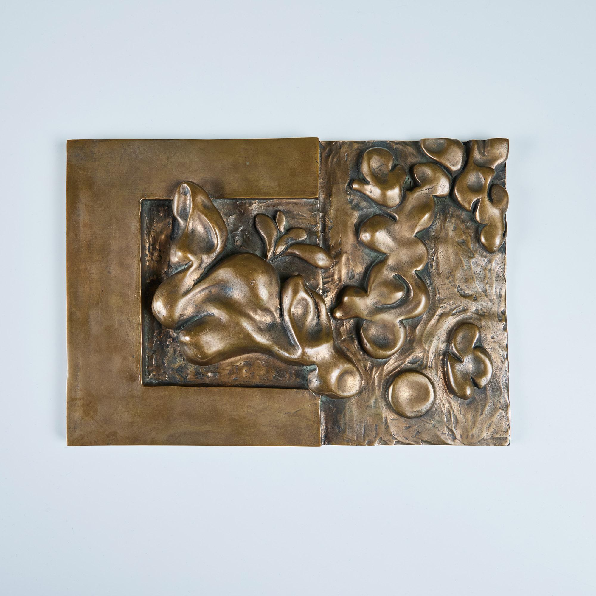 Abstract case bronze decorative plaque in the style of Edgar Britton. This weighty sculptural piece features three dimensional figures. A fun wall hanging or sculpture table piece.

Dimensions
13