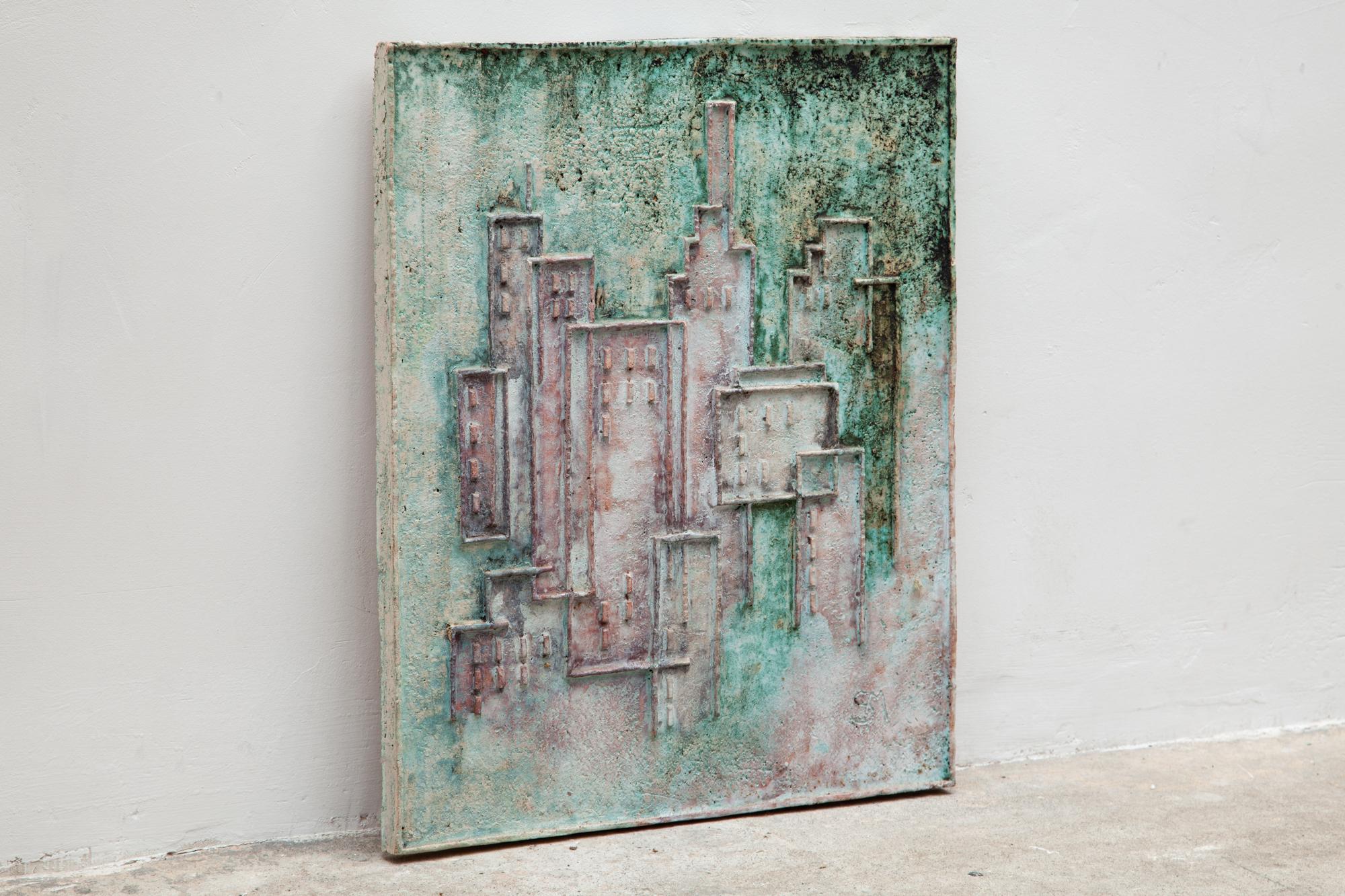 Very nice ceramic relief abstract designed by unknown Belgium artist in the seventies. The abstract sculpture in grey ceramic was glazed in dark grey, green and pink tones. This wall sculpture is in a good condition. Signed SM- unknown artist.