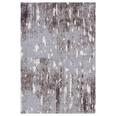 Tapis de sol abstrait contemporain en gris violet, fait main en soie et laine "Alps"