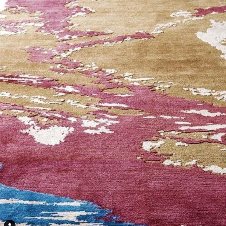 This contemporary rug design is interpreted in lustrous silk beautifully contrasting with the soft Himalayan wool, using hand-knotting techniques. handcut-pile provides three-dimension finish that enhances the design’s abstract motifs.