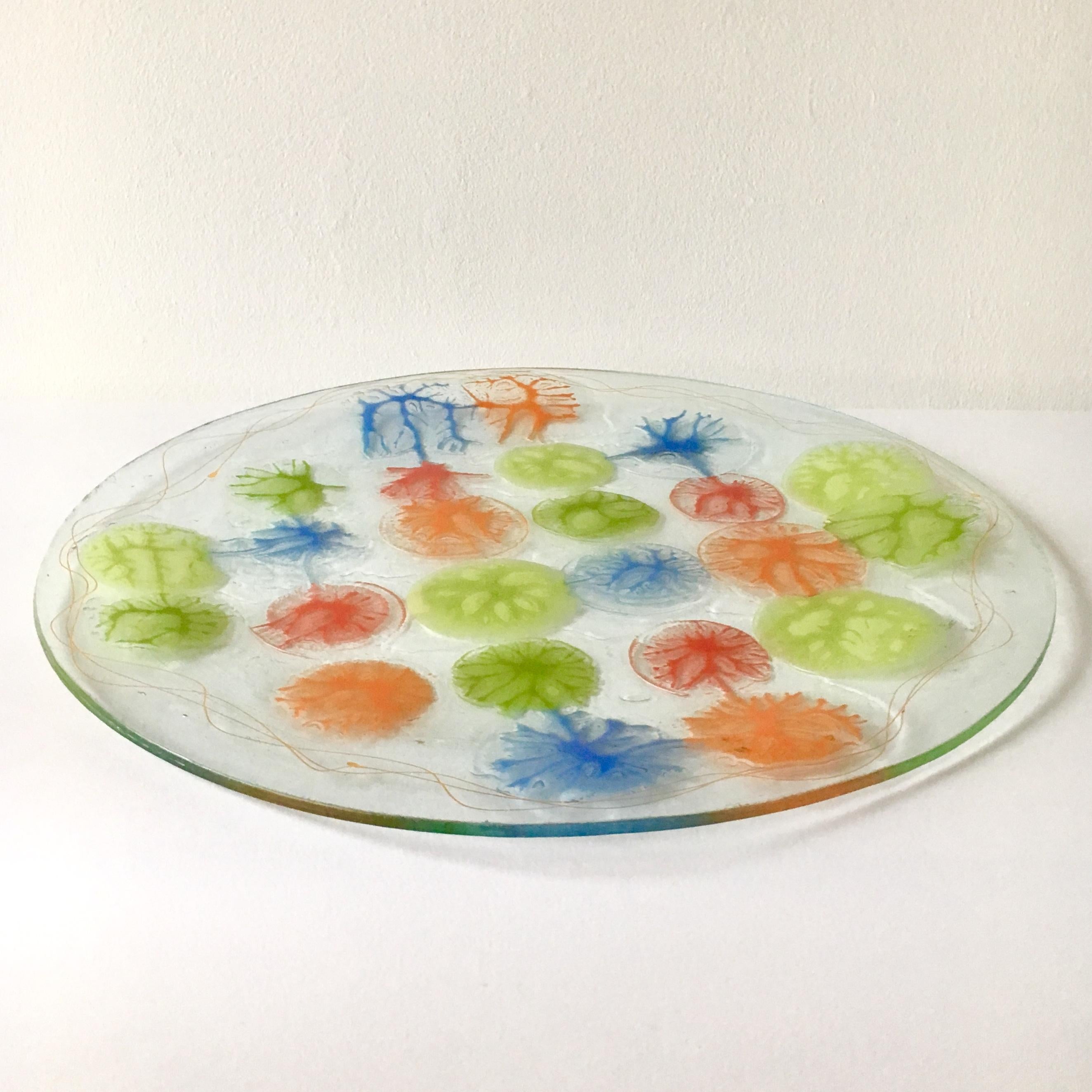 An abstract coral circular fused studio glass plate by Michael and Frances Higgins USA etched signature, late 1960-early 1970s

Michael Higgins (1908-1999) and Frances Higgins(1912-2004) met in Chicago and were married in 1948. They had a