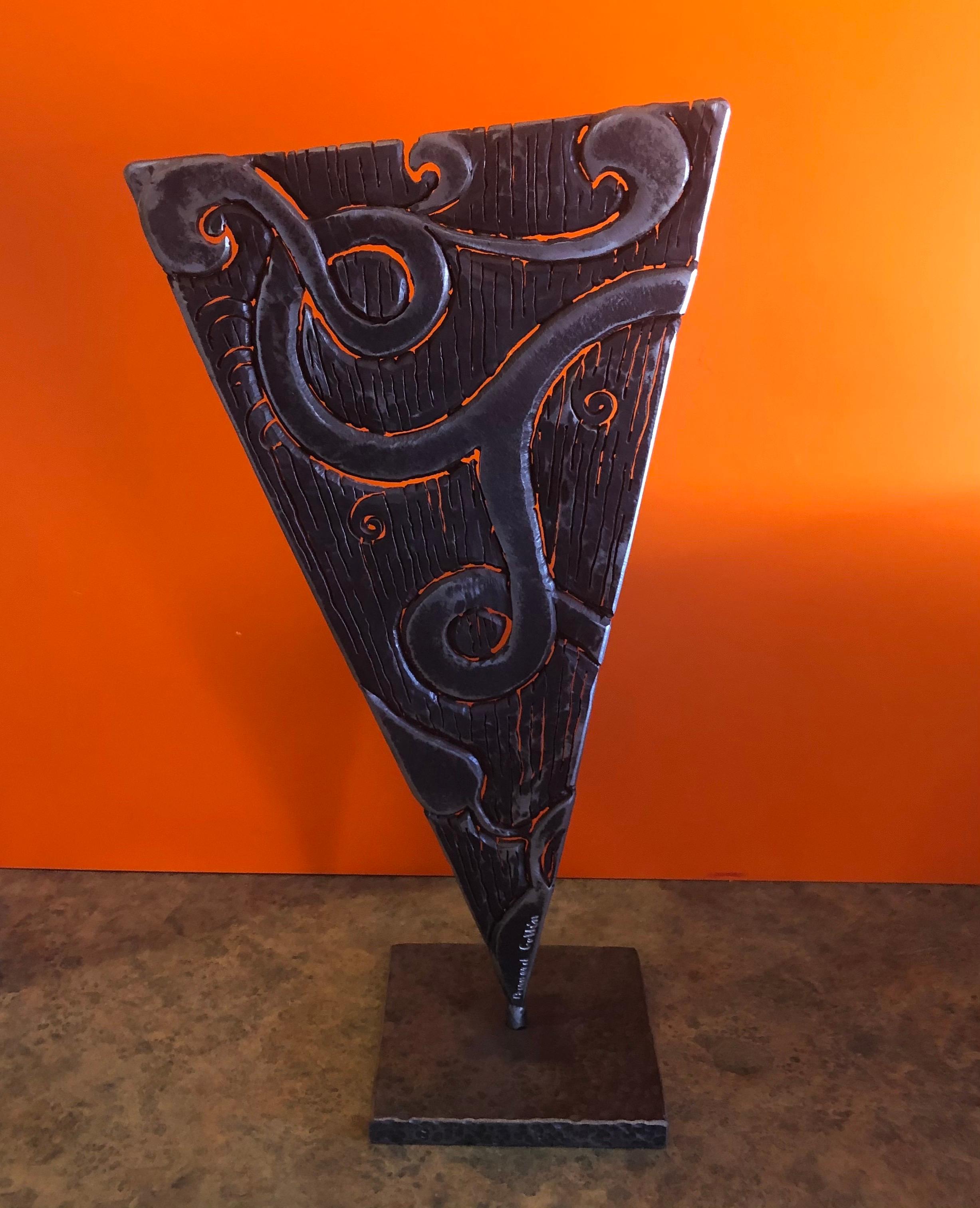 Abstract cut steel sculpture by Bernard Collin, circa 1980s. The piece is signed on the lower half and measures: 9.75