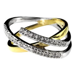 Bague à motif abstrait en or jaune et blanc 18 carats sertie d'un diamant français