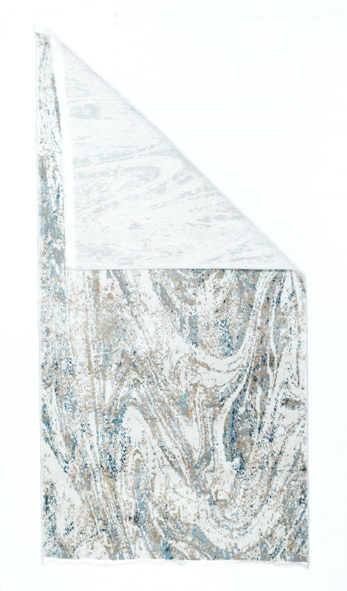 Tapis à motifs abstraits 2'7'' x 4'11''.