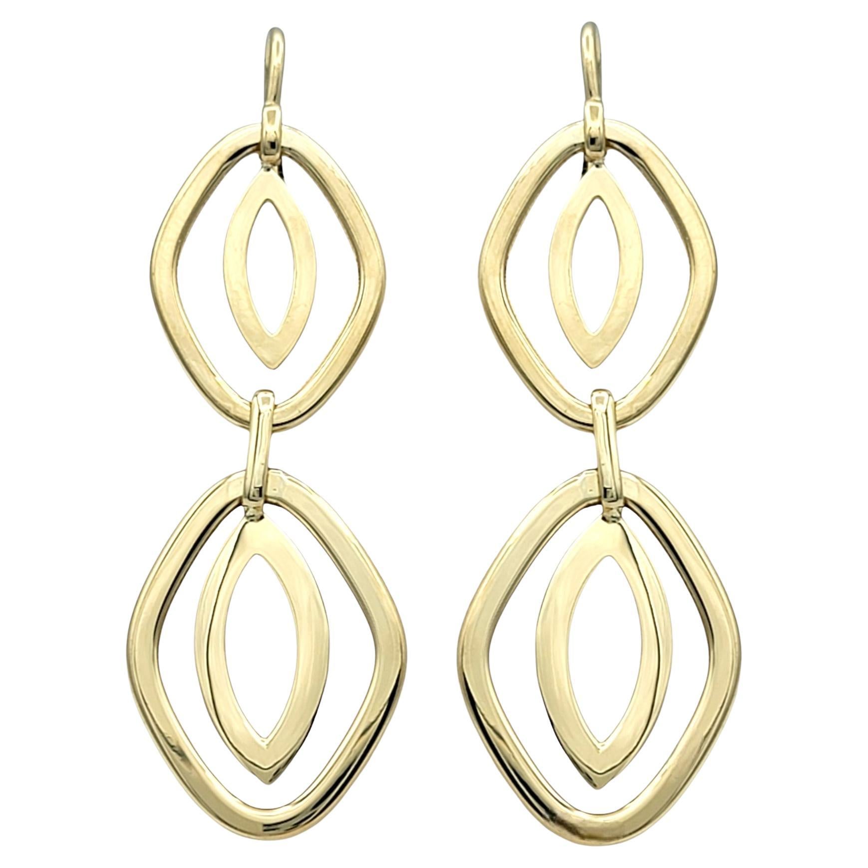 Abstract Double Oval Two-Tiered Dangle Earrings in Polished 14 Karat Yellow Gold