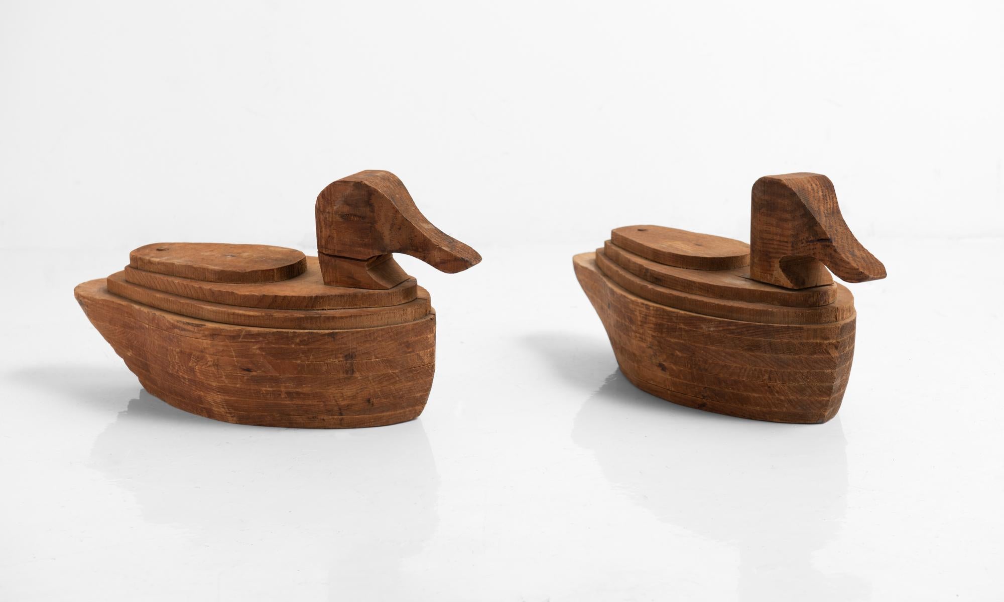 Abstract duck sculptures, circa 1930.

Unique forms constructed of cut wood to provide a unique, stacked effect.