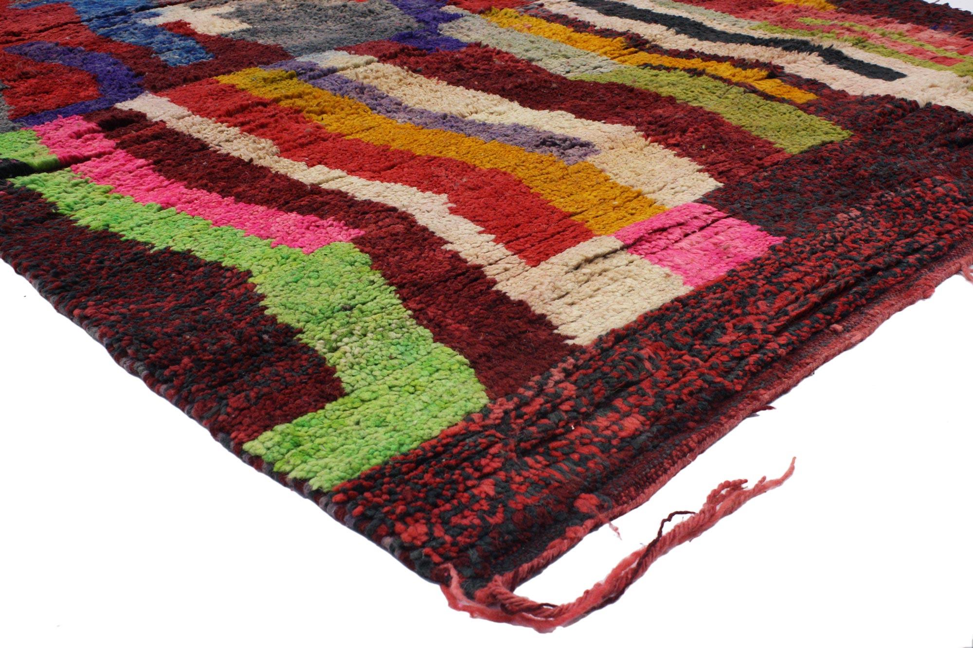 20297 Vintage Berber Moroccan Rehamna Rug with Tribal Style. Bursting with poly-chromatic brilliancy, a bold geometric pattern with angular designs, this hand-knotted wool Berber Moroccan Rehamna rug beautifully showcases Abstract Expressionism and