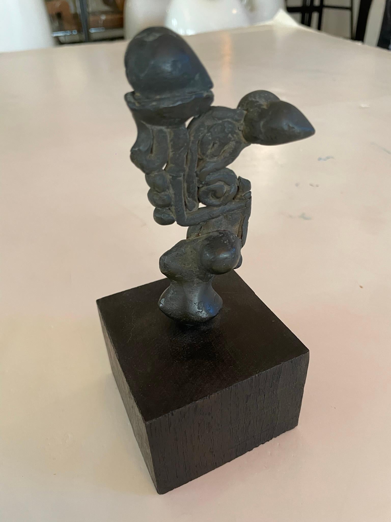 Abstract expressionist bronze sculpture on wood base. France, 1930s.