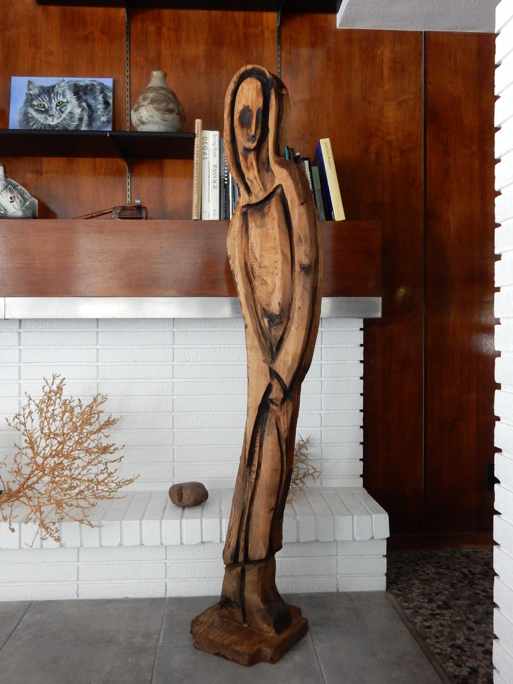 Life-size (over 5 feet tall) expressionist wood floor sculpture, circa 1950s.
Moody figure, reminiscent of 