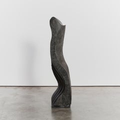 Abstract floor sculpture in slate