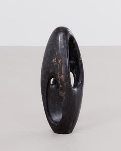 Abstract floor standing sculpture in Belgian granite