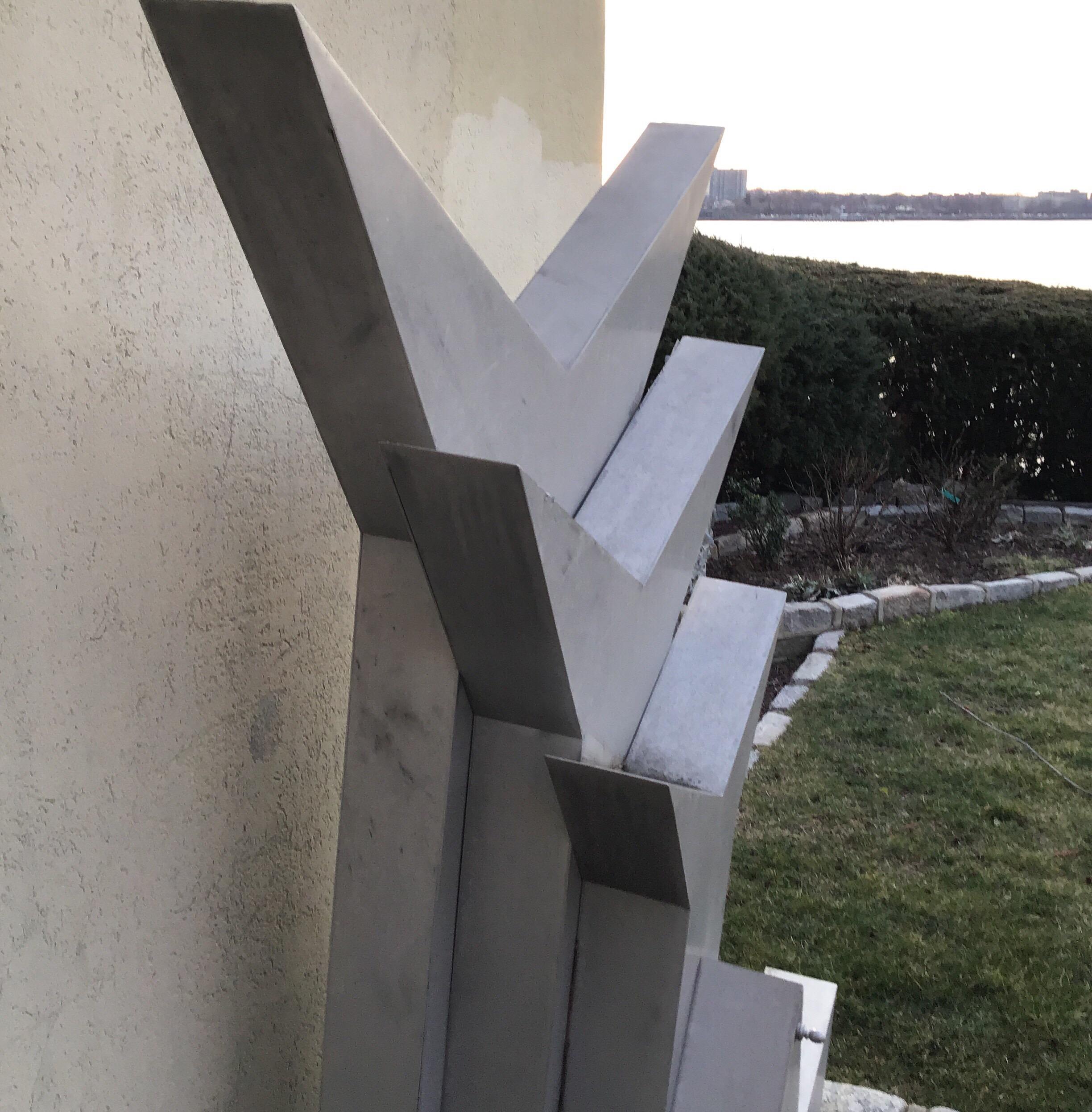 Aluminum 4-piece garden sculpture.