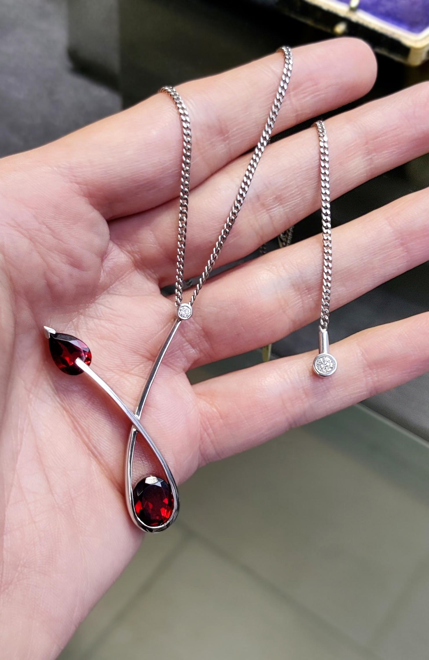 Oval Cut Abstract Garnet and Diamond Platinum Pendant and Chain For Sale
