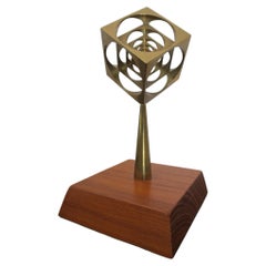 abstract geometric metal sculpture from the 60s in the style of Victor Vasarely