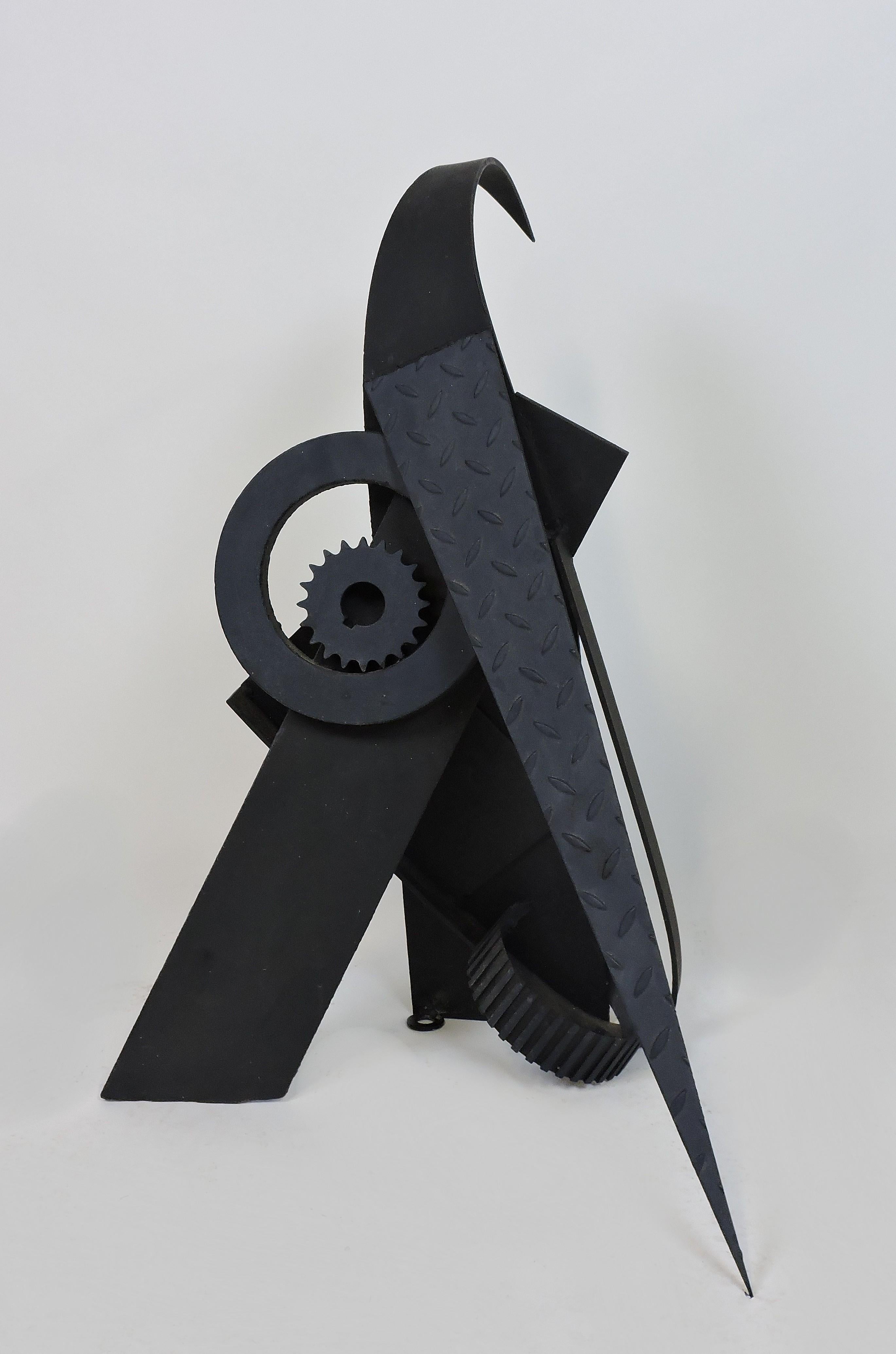 Escultura industrial abstracta de acero soldado 