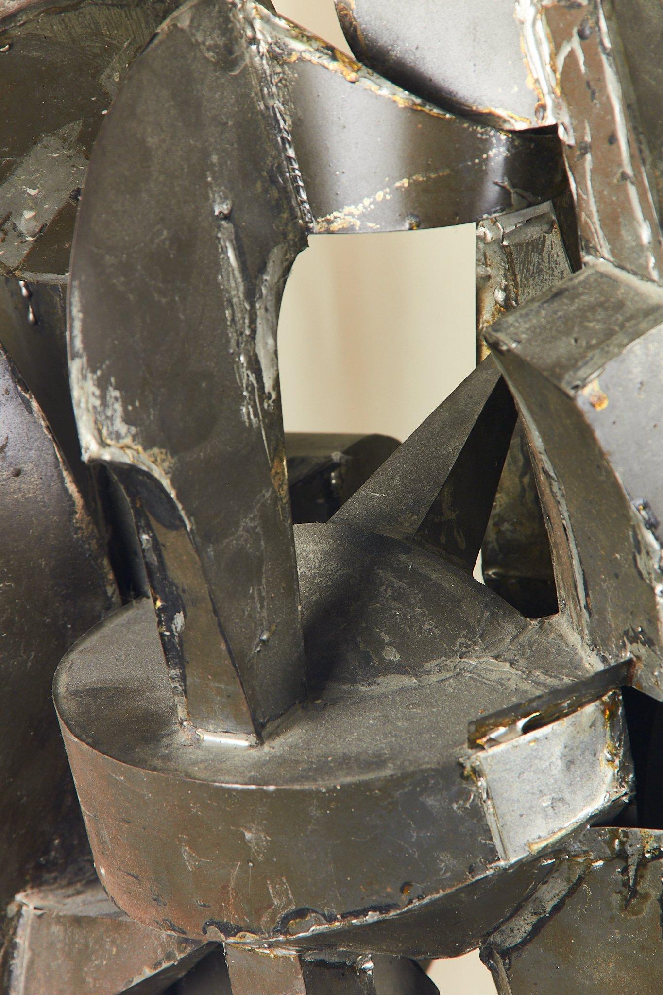 Abstract sculpture belonging to the constructivist current of the 1960s/70s, made of galvanized sheet metal by artist Sergio Ponzio called Ponzio IV.
Pontius was an artist who produced little , one remembers exhibitions in Paris and  New York City