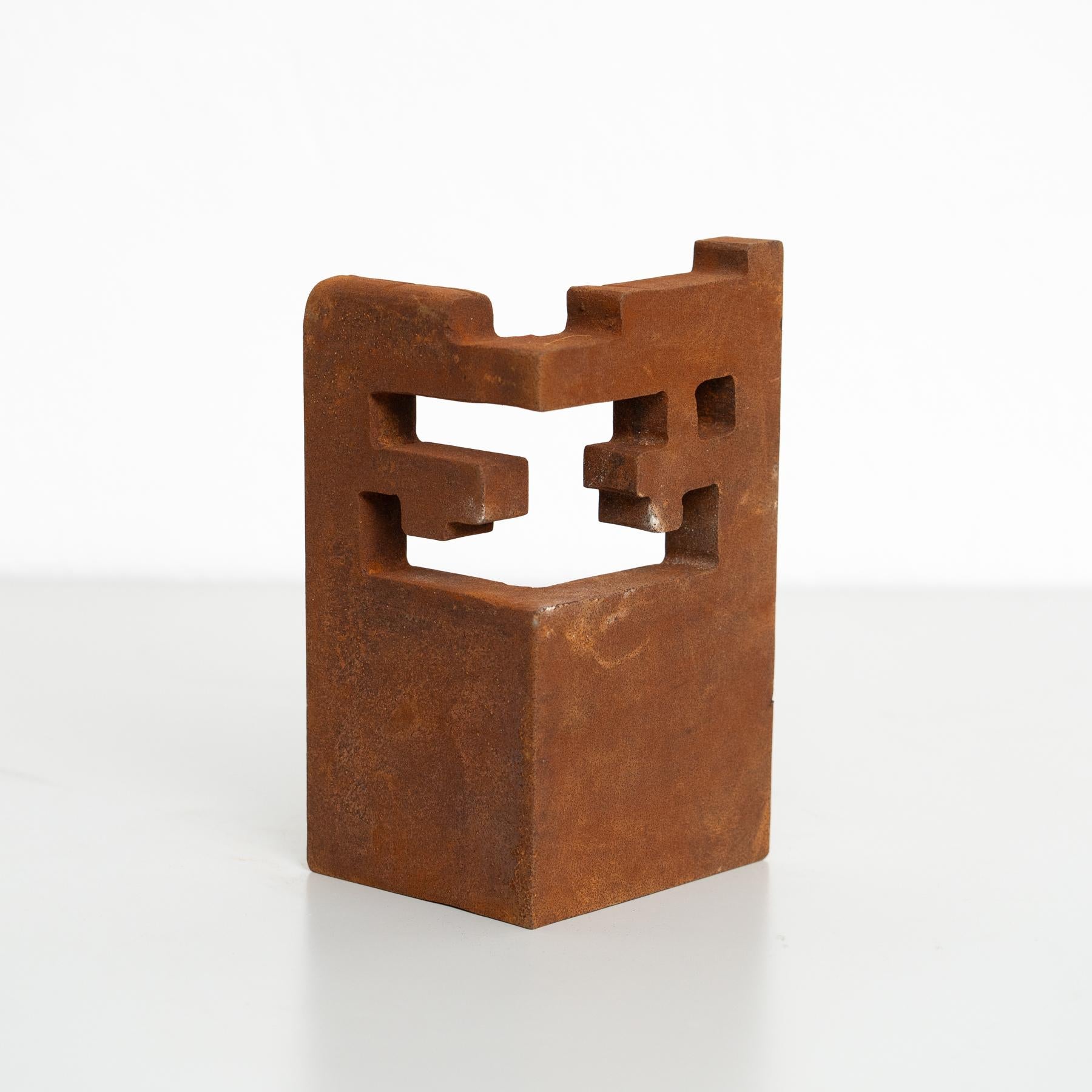 This exquisite abstract sculpture, crafted from iron, is a striking piece inspired by the bold and evocative works of renowned Spanish artist Eduardo Chillida. Made in Spain around 1990 by an unknown artist, it showcases the timeless beauty of