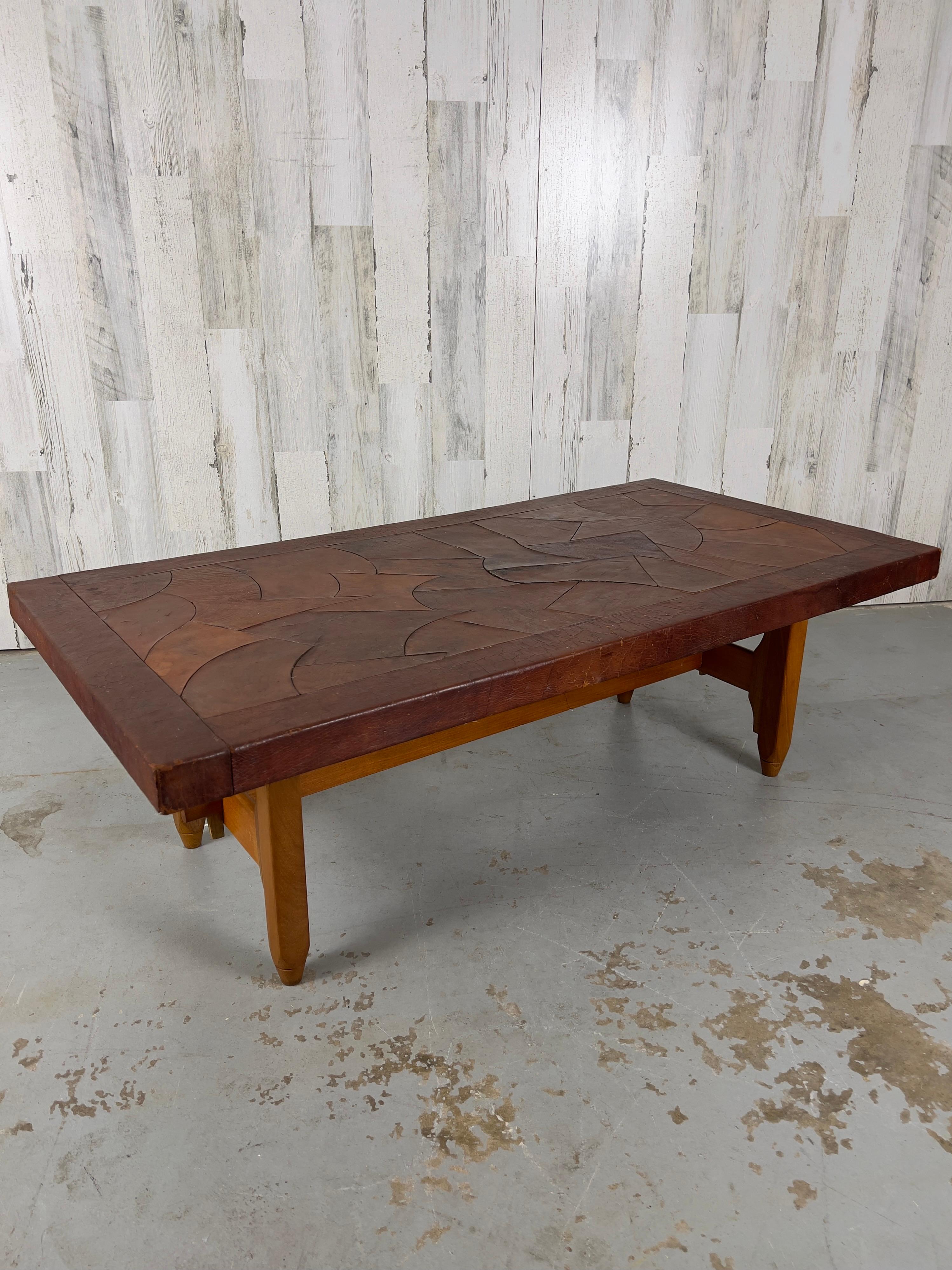 Abstract Leather Top Coffee Table by 