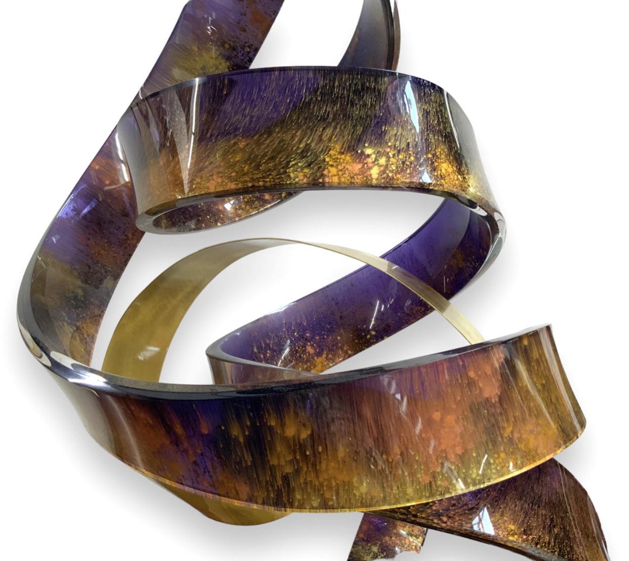 Spiral sculpture constructed of acrylic (lucite), brushed brass and metal by noted artist Shlomi Haziza. Ribbons of violet and gold acrylic along with brass  spiral up from an acrylic base. Signed. 