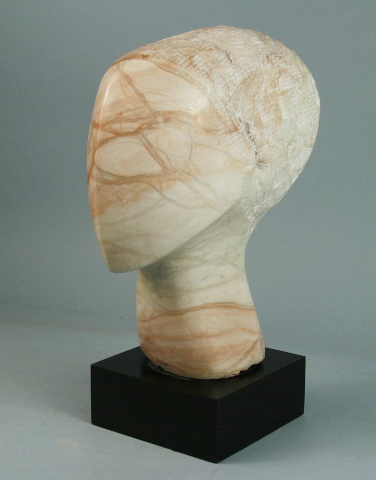 3-570 Hand carved abstract sculpture with both finished and rough cut areas.