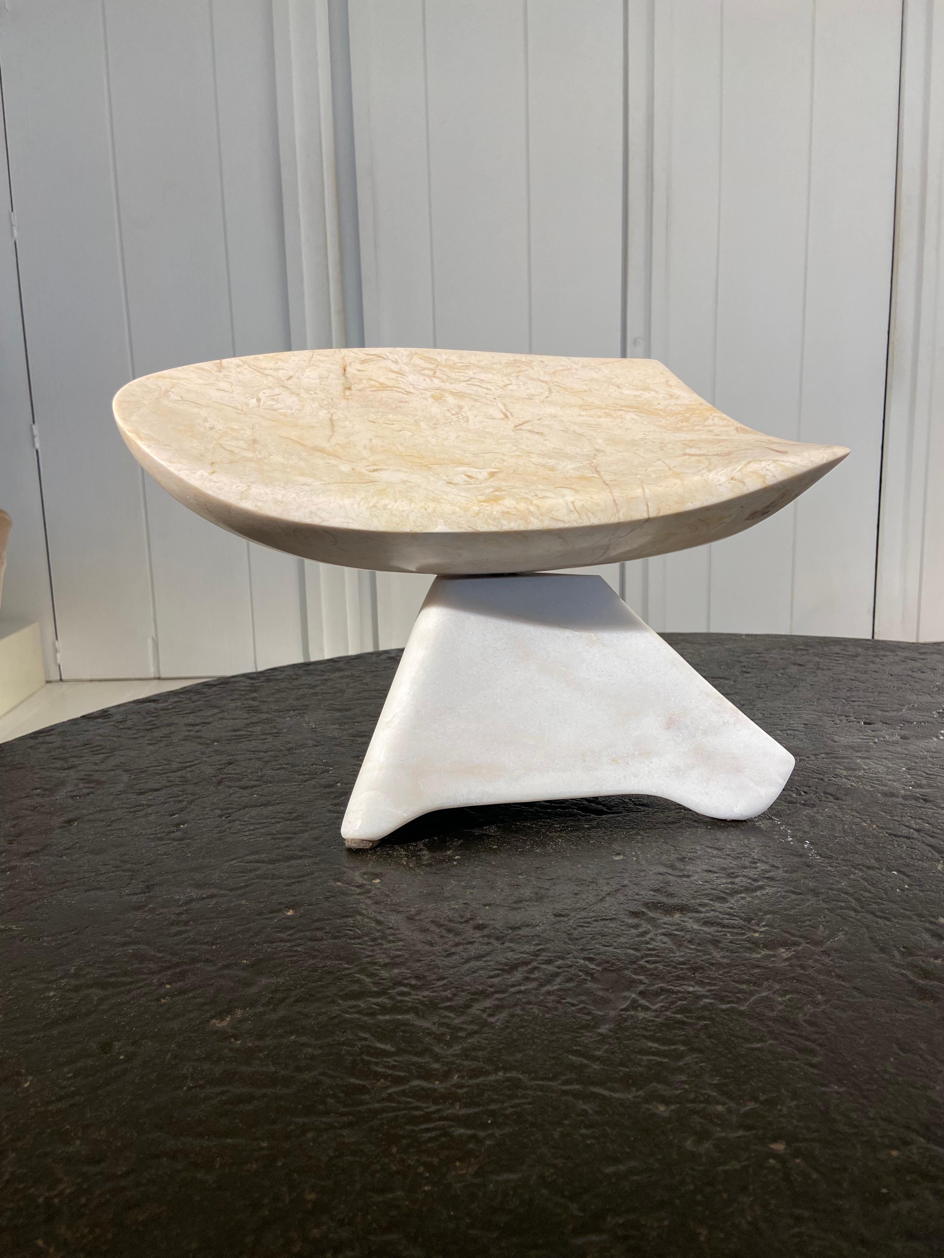 Abstract marble sculpture with a 360-degree rotation mechanism, created by French artist Jean-Frédéric Bourdier. Base of Estremoz marble.