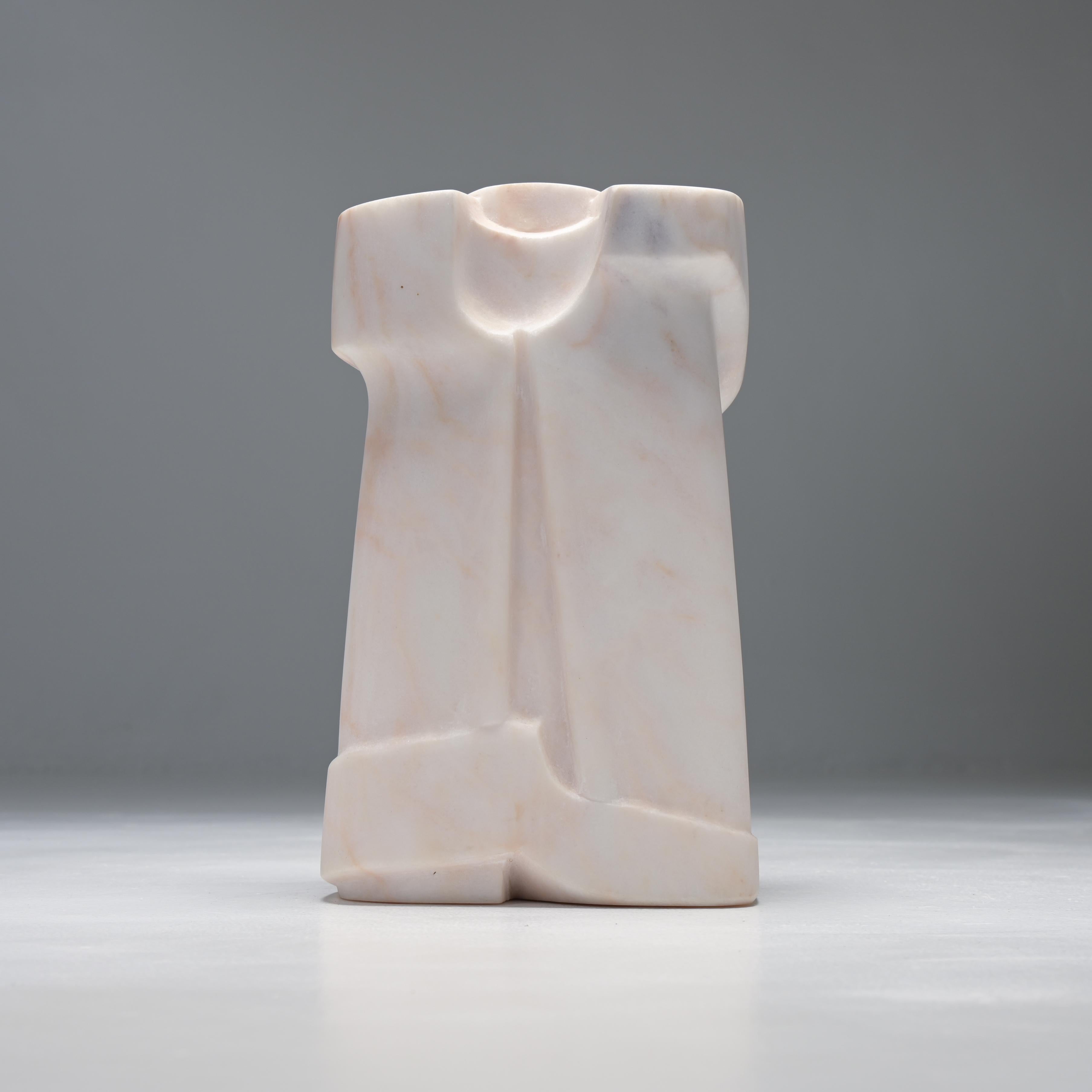 This abstract sculpture in Portuguese marble was sculpted ‘en taille directe’ by the Belgian artist Jan Keustermans.
The soft pink veins of the Portuguese marble are beautiful.
The sculpture is not signed. It is a unique piece, one of his most