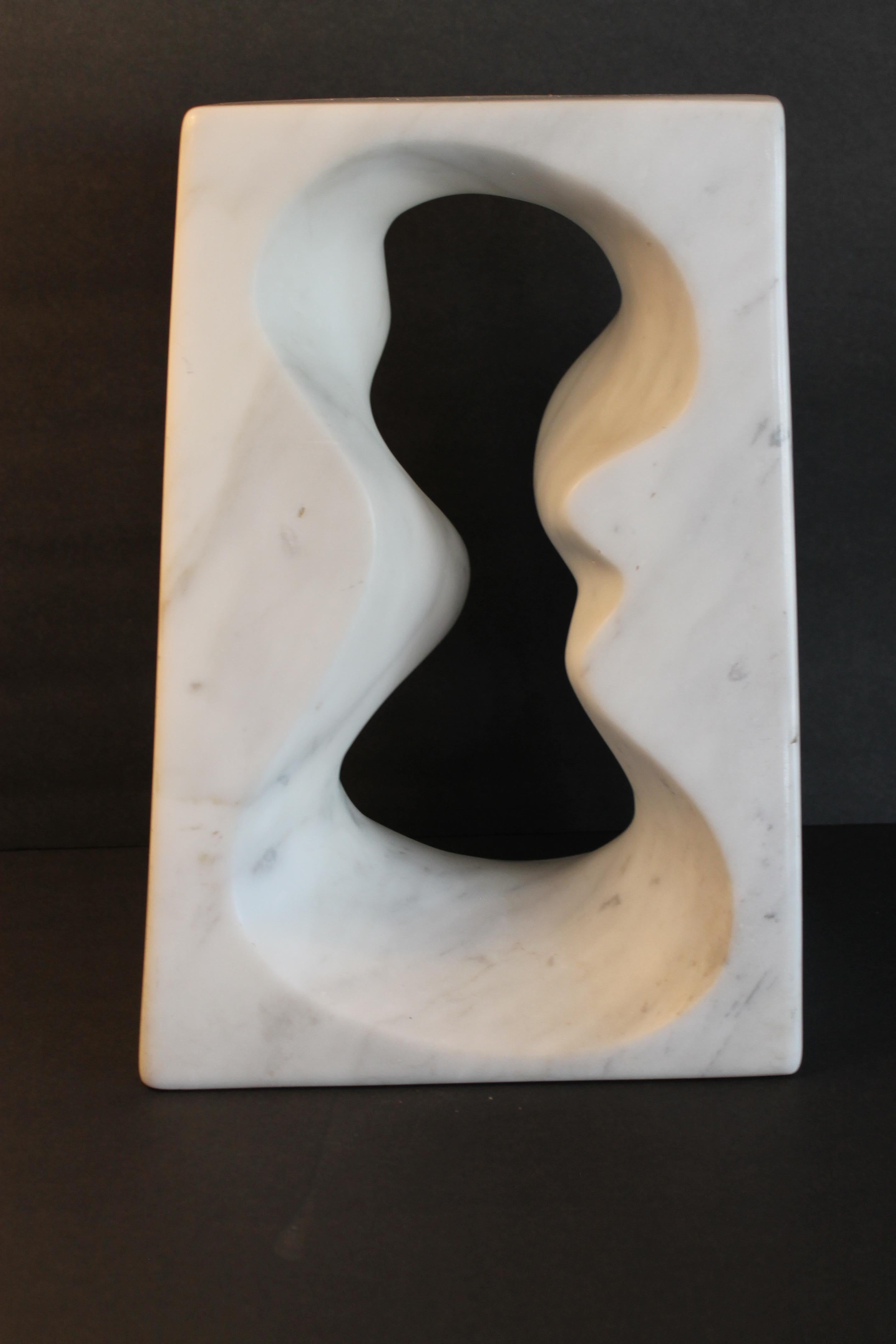 Marble sculpture signed M.M. Sculpture is white with grayish veins. Sculpture measures: 10.5