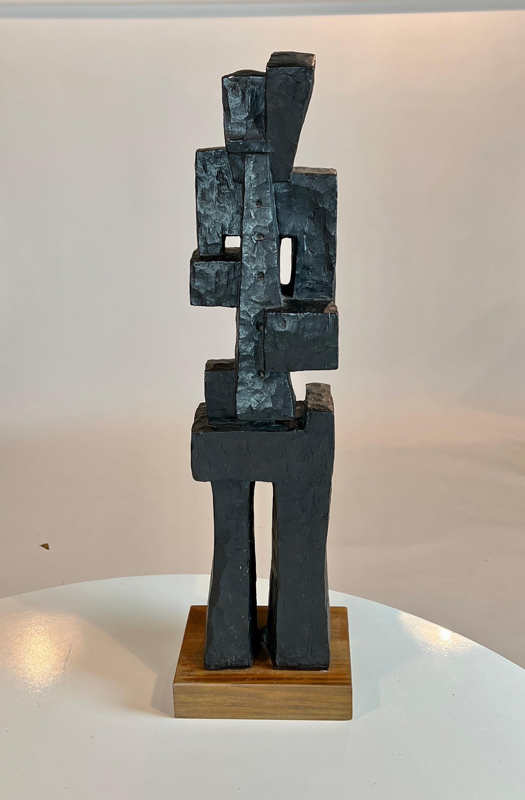 Abstract brutalist modern plaster sculpture of a horn player on a walnut plinth signed, Austin Productions.